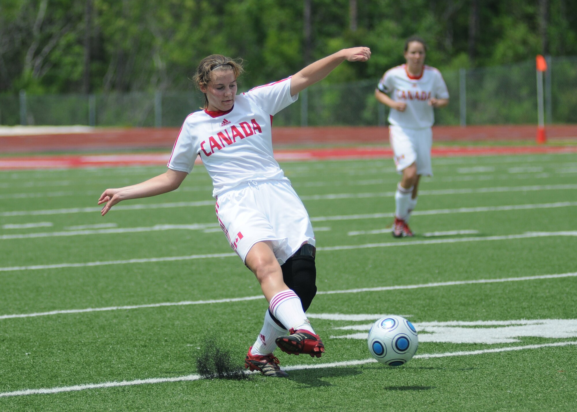 Germany took the consolation match over Canada, 4-1, during the final day of the 5th CISM Women’s Soccer Championship at the Biloxi High Stadium, June 13.  The CISM tournament, hosted by Keesler Air Force Base, also included teams from Brazil, France, The Netherlands, the Republic of South Korea and the United States.   The Brazilian team won the gold medal, Korea earned the silver medal and The Netherlands took the bronze medal.  (U.S. Air Force photo by Kemberly Groue)