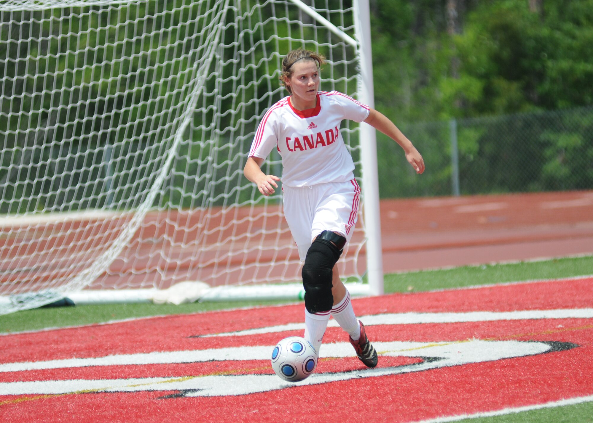 Germany took the consolation match over Canada, 4-1, during the final day of the 5th CISM Women’s Soccer Championship at the Biloxi High Stadium, June 13.  The CISM tournament, hosted by Keesler Air Force Base, also included teams from Brazil, France, The Netherlands, the Republic of South Korea and the United States.   The Brazilian team won the gold medal, Korea earned the silver medal and The Netherlands took the bronze medal.  (U.S. Air Force photo by Kemberly Groue)