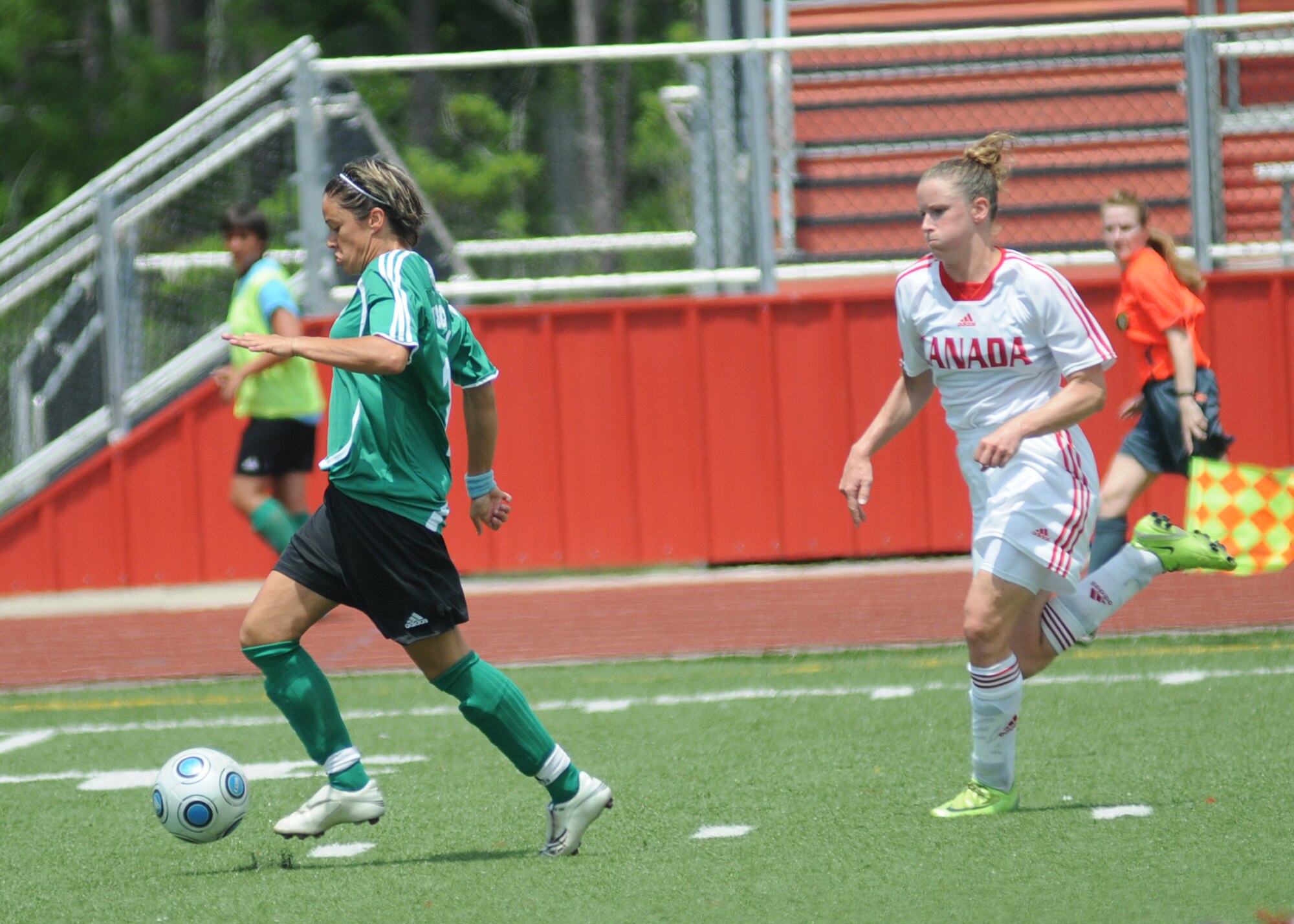 Germany took the consolation match over Canada, 4-1, during the final day of the 5th CISM Women’s Soccer Championship at the Biloxi High Stadium, June 13.  The CISM tournament, hosted by Keesler Air Force Base, also included teams from Brazil, France, The Netherlands, the Republic of South Korea and the United States.   The Brazilian team won the gold medal, Korea earned the silver medal and The Netherlands took the bronze medal.  (U.S. Air Force photo by Kemberly Groue)
