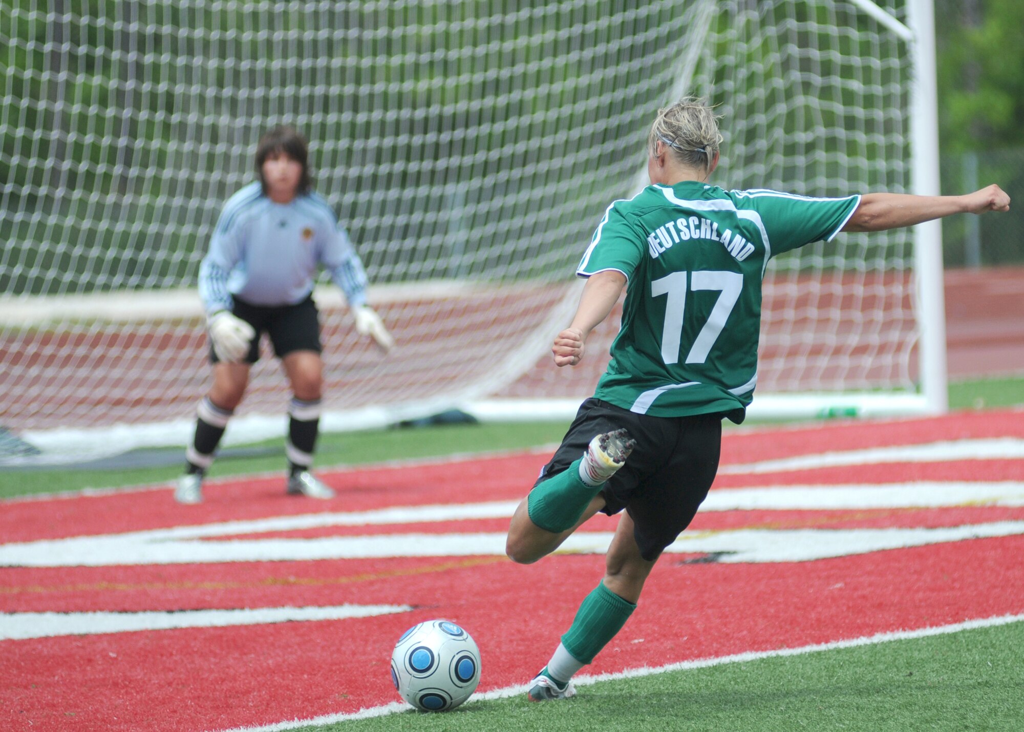 Germany took the consolation match over Canada, 4-1, during the final day of the 5th CISM Women’s Soccer Championship at the Biloxi High Stadium, June 13.  The CISM tournament, hosted by Keesler Air Force Base, also included teams from Brazil, France, The Netherlands, the Republic of South Korea and the United States.   The Brazilian team won the gold medal, Korea earned the silver medal and The Netherlands took the bronze medal.  (U.S. Air Force photo by Kemberly Groue)