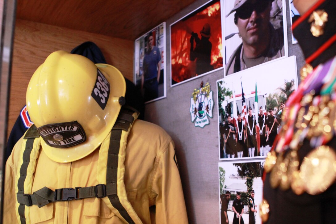 The ceremony commemorated Sgt. Brian E. Dunlap with a permanent display of his dress blue and firefighter uniforms that will remain in San Diego’s Hook and Ladder Firehouse Museum June 13.