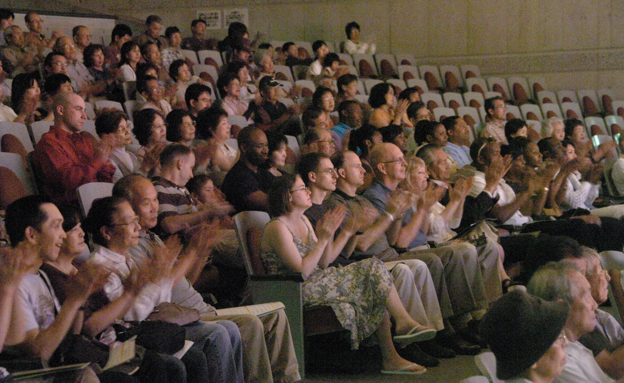 MIZUHO, Japan -- More than 20 members of the 374th Maintenance Group attended the Mizuho Youth Symphonic Band concert June 14 at the Mizuho Viewpark Sky Hall. Senior Master Sgt. Daniel Smalley, U.S. Air Force Band of the Pacific-Asia, sang a variety of numbers during the concert, including "I Left My Heart in San Francisco" and "New York, New York" for a crowd of more than 300. (U.S. Air Force photo/Master Sgt. Matt Summers)