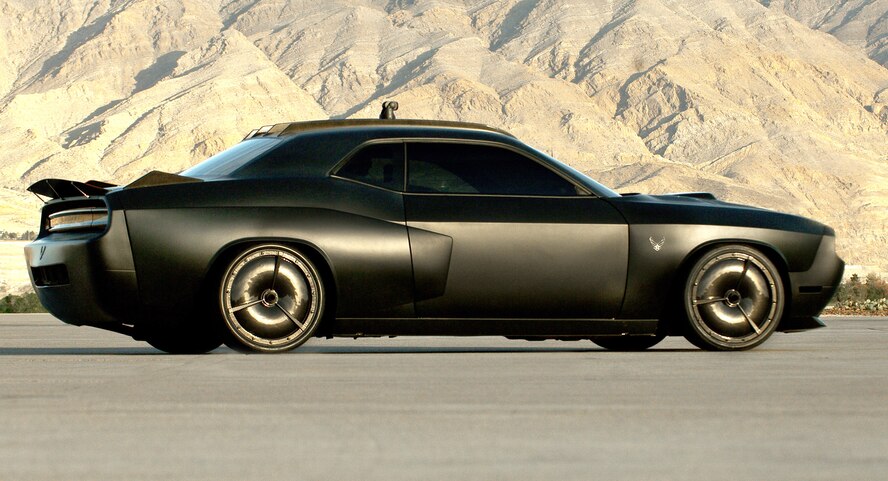 The stealth-black Air Force Challenger 'Vapor' features a biometric access to open the vertical doors, a custom stealth body kit with jet enhancements and a carbon fiber exterior trim. Other exterior components include one-off carbon fiber wheels, a custom stealth exhaust mode that allows the vehicle to run in complete silence or the headers can be opened facilitate the aggressive sound of the engine. The vehicle features a shaker hood, radar-absorbing paint, proximity sensors and a 360-degree camera with a quarter-mile range. The Vapor is one of the Air Force's newest mobile marketing assets and will be touring high schools and a variety of Air Force sponsored events as part of the 2009 Super Car Tour. (U.S. Air Force photo/Master Sgt. Scott Reed) 