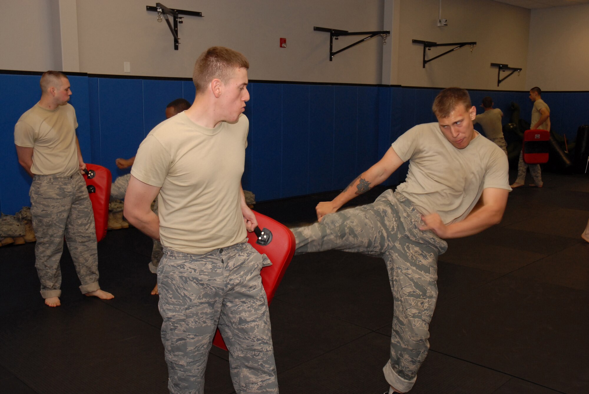 Fly-Away Security Team (FAST) students learn proper strike techniques during ground fighting training at the U.S. Air Force Expeditionary Center, Joint Base McGuire-Dix-Lakehurst, N.J. on June 4, 2009. FAST members provide airfield assessment and aircraft security for Air Force Central Command  transient resources. (U.S. Air Force Photo/Tech. Sgt. Paul R. Evans)