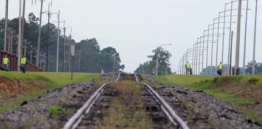 MOODY AIR FORCE BASE, Ga. -- Moody Airmen pick up trash along the perimeters of base during a Pride Patrol here June 5. Pride Patrols provide Airmen an opportunity to volunteer their time in the community by keeping it free of trash. (U.S. Air Force photo by Airman 1st Class Joshua Green) 