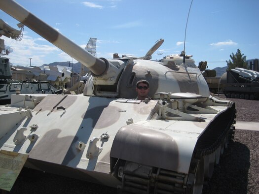 Cadet First Class Andrew Novak gets a tour of a T-55 tank at the Threat Training Facility at Nellis AFB, Nev. Cadet Novak worked at the Air Force Operational Test and Evaluation Center’s Detachment 6 at Nellis for five weeks. He is part of the AFOTEC Mentoring Program that integrates U.S. Air Force Academy cadets into operational test teams during the USAFA’s Cadet Summer Research Program where cadets work on real-world Air Force projects. Cadet Novak is an aeronautical engineering student.