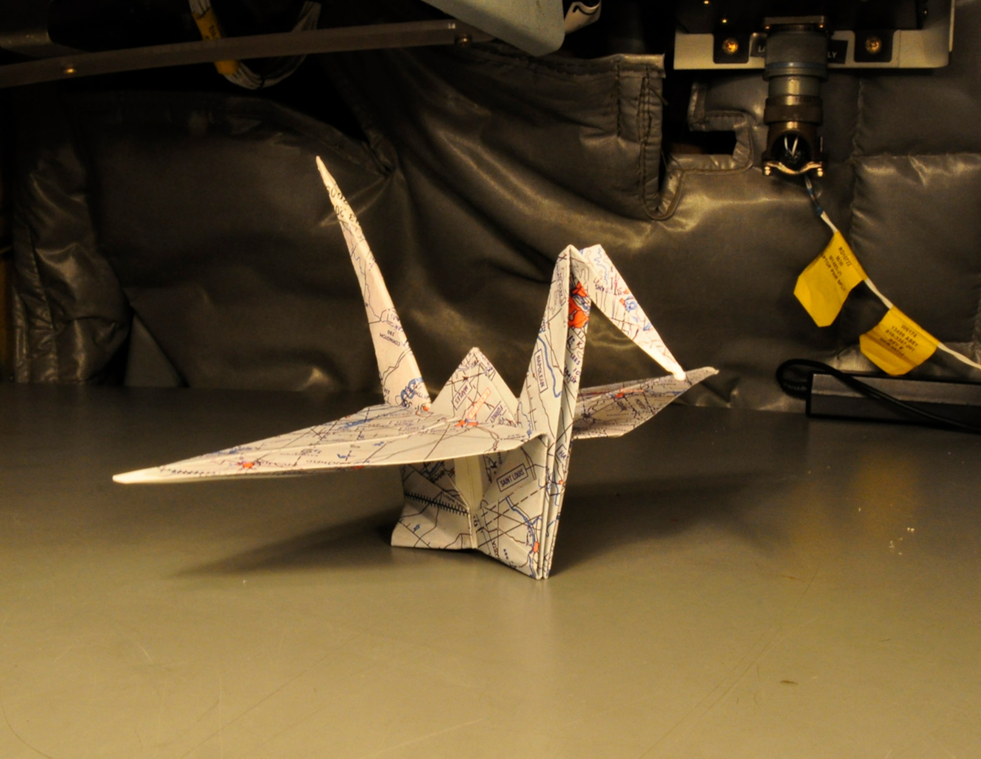 An origami crane sits on display inside a KC-135 Stratotanker flown during what Lt. Col. Tsuyoshi "T" Tung declared an Asian-Pacific American Heritage Sortie on May 27. Colonel Tung is a KC-135 pilot assigned to the 18th Air Refueling Squadron, the flying unit of the 931st Air Refueling Group. He was born in Japan and moved to the United States when he was 5 years old. (Courtesy photo/Lt. Col. Tsuyoshi Tung)