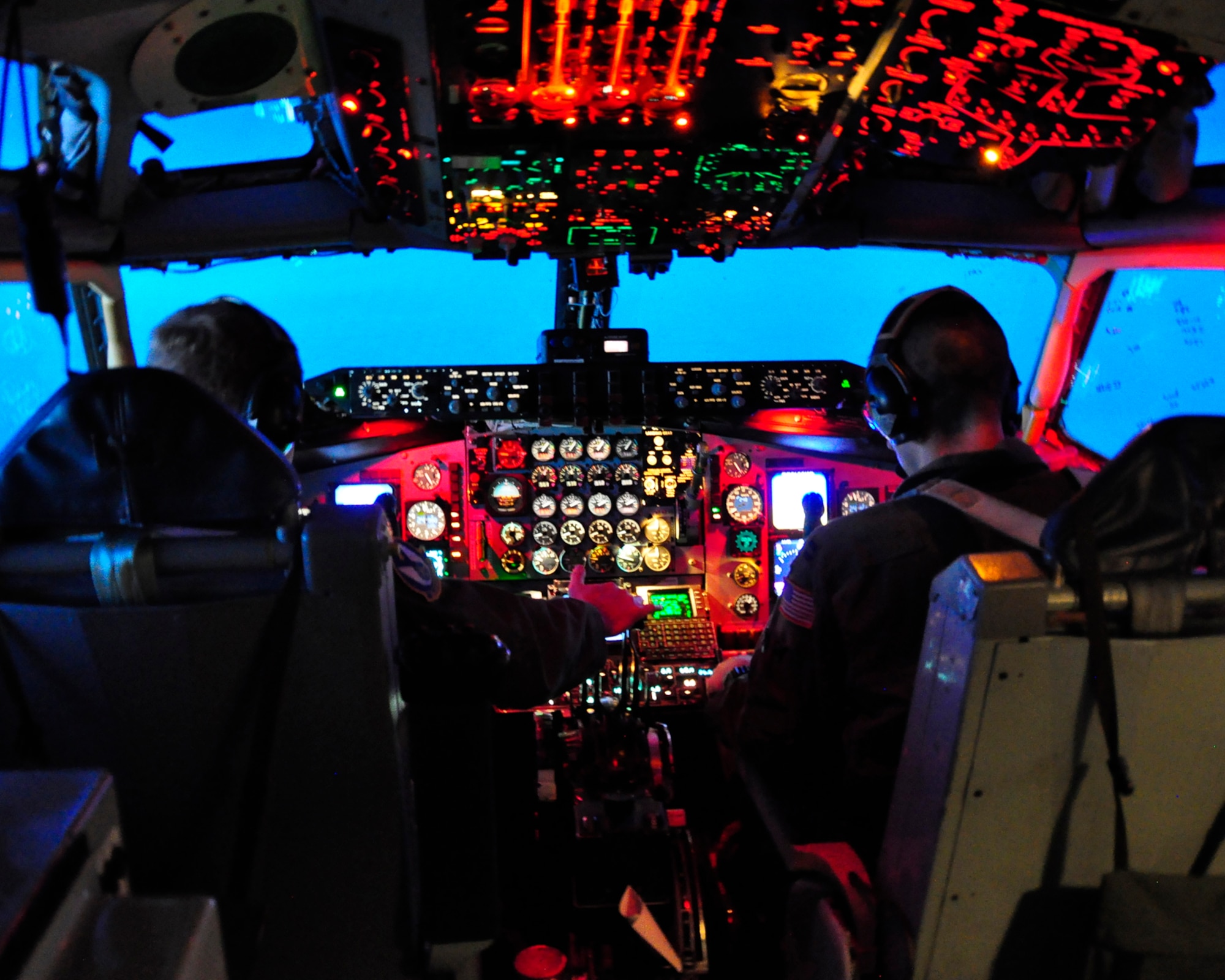 Lt. Col. Brad Anderson and Capt. Jon Murphy man the controls of a KC-135 Stratotanker during a training mission on May 27. The trouble-free mission allowed the two pilots and their fellow Reserve crewmembers from the 18th Air Refueling Squadron to also celebrate Asian-Pacific American Heritage Month. (Courtesy photo/Lt. Col. Tsuyoshi "T" Tung)