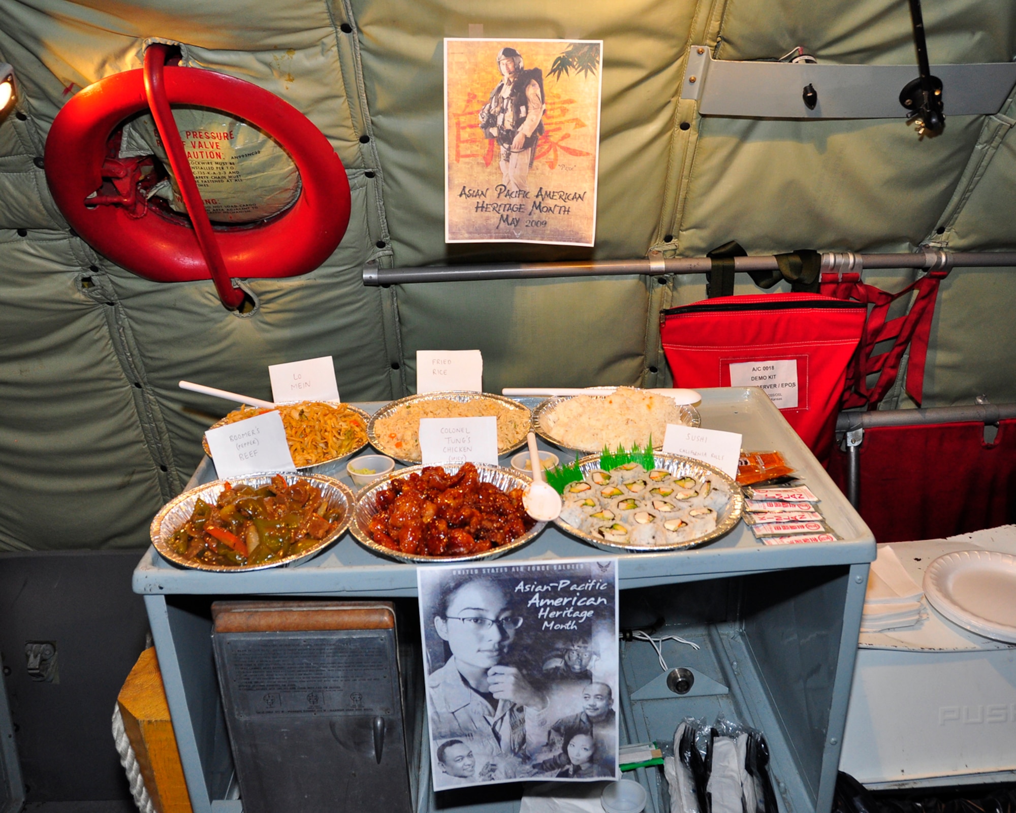 A KC-135 Stratotanker galley serves as a table for traditional Chinese and Japanese foods during a training mission that originated at McConnell Air Force Base, Kan., on May 27. Reservists assigned to the 931st Air Refueling Group at McConnell celebrated Asian-Pacific American Heritage Month during the mission. (Courtesy photo/Lt. Col. Tsuyoshi Tung)
DSC5620 - Photo by TSgt Greg Carron

Various traditional Chinese and Japanese dishes are shown ready to be consumed at the galley station of a KC-135 tanker at McConnell AFB, Kansas. The food was prepared in celebration of the 931st ARG's May celebration of Asian-Pacific American Heritage Month, and served to the air and ground crewmembers during the hour-long airplane preflight prior to the airborne training mission. One of the highlights was 18th ARS Lt Col Tsuyoshi Tung's popular Szechuan recipe, aptly-named "Colonel Tung's Chicken."