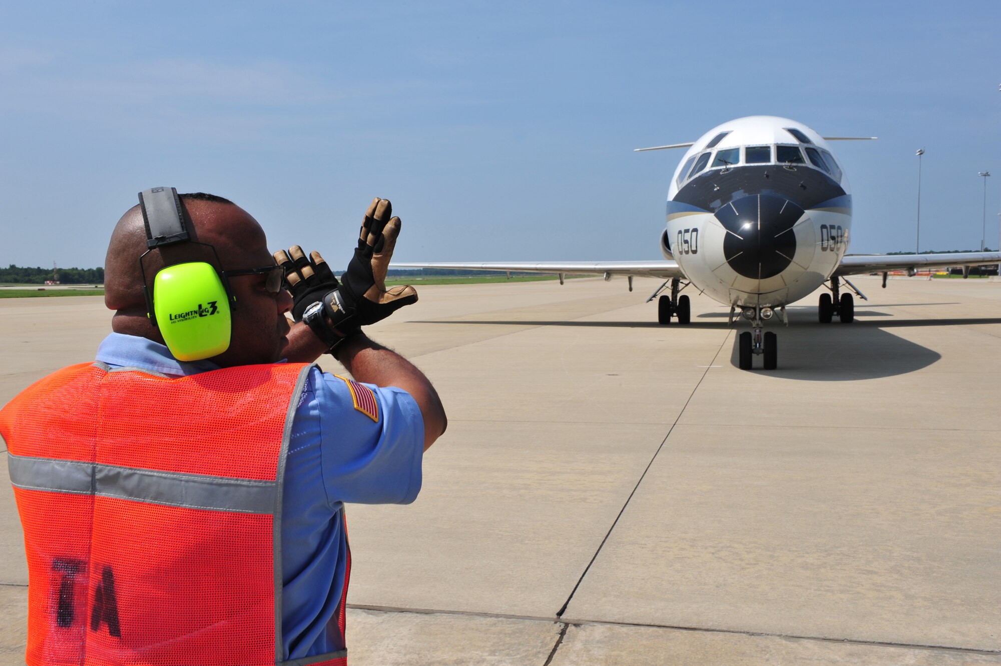 SHAW AIR FORCE BASE, S.C.-  Transient Aircraft Service member Greg McLean marshals the plane containing the Air Combat Command Inspector General Team which will conduct Shaw's operational readiness inspection. The inspection provides Shaw the opportunity to demonstrate its combat potential and lethality, June 14, 2009. (U.S. Air Force Photo by: TSgt Josef Cole)