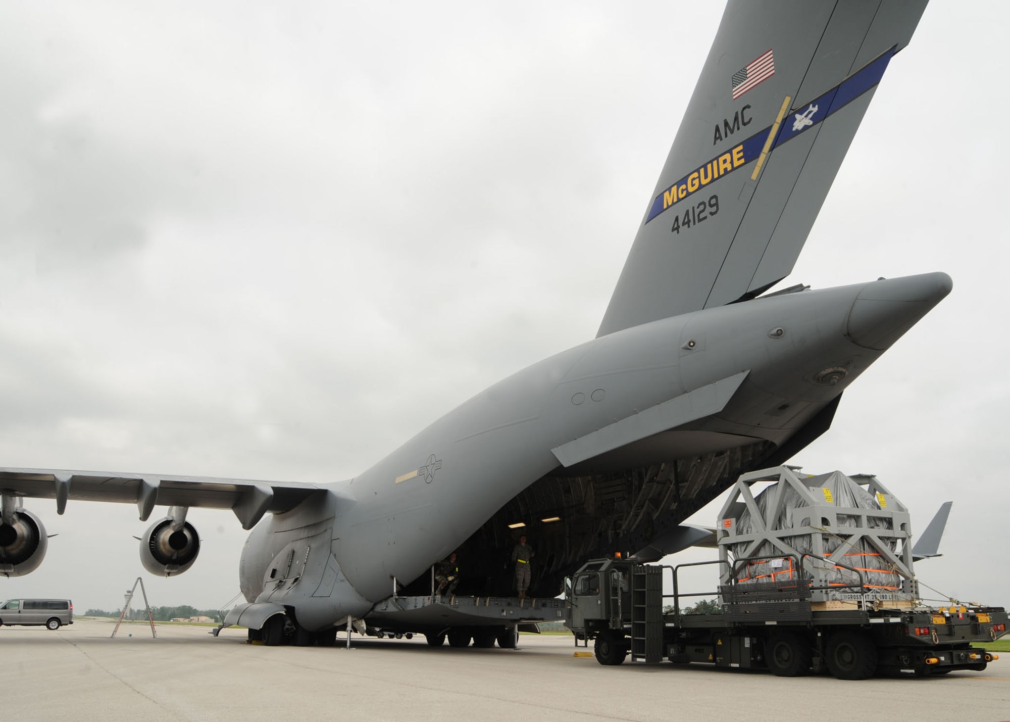 Airmen from Scott Air Force Base, Ill., load an MRI machine onto a C-17 Globemaster III here June 12, 2009. The MRI machine, which was donated by Washington University in Saint Louis, Mo., will be flown to Salta, Argentina, by the U.S. Air Force to aid in their humanitarian mission there. (U.S. Air Force photo/Airman 1st Class Wesley Farnsworth)