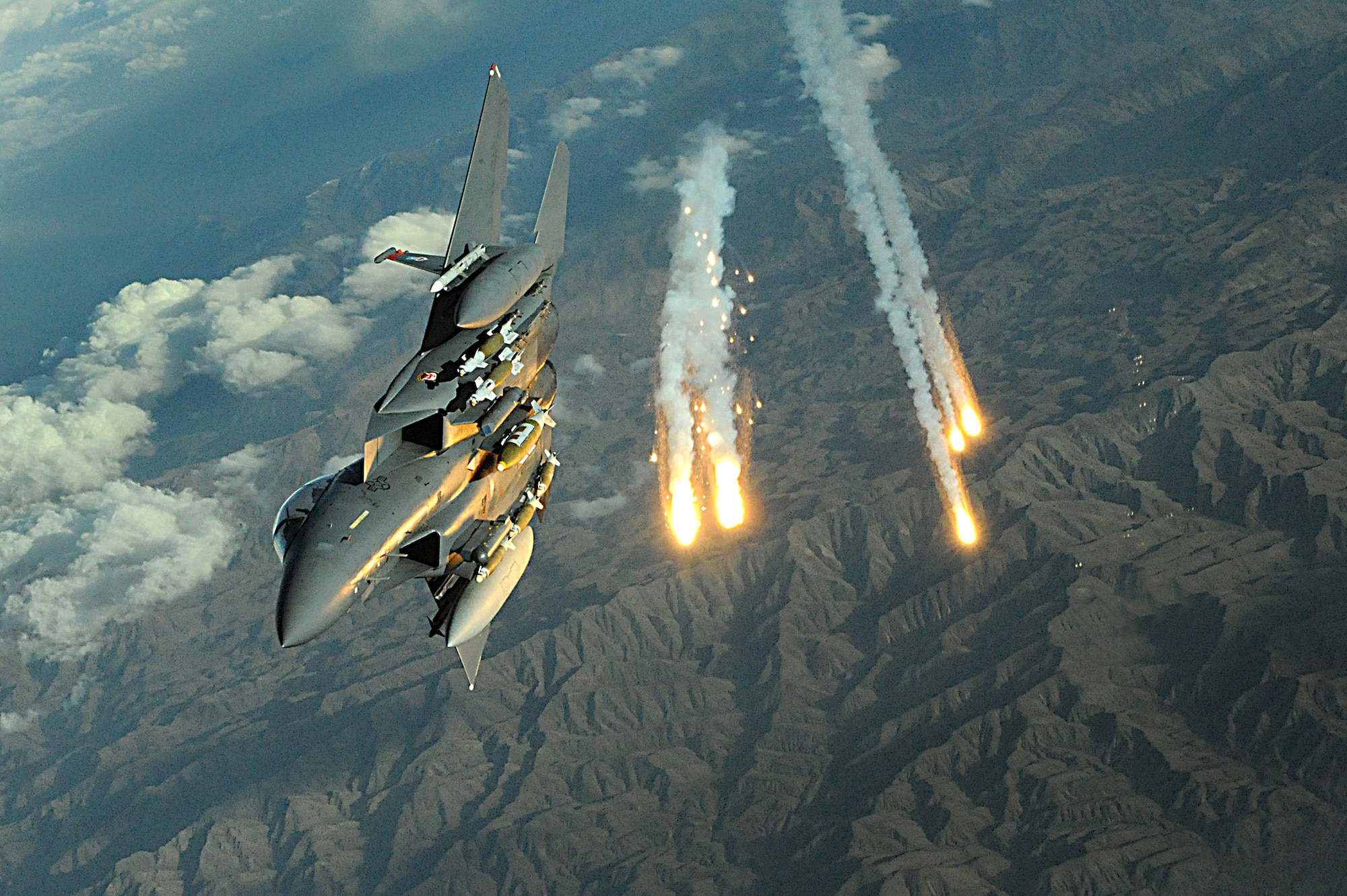 An F-15E Strike Eagle from Bagram Air Base deploys flares over Afghanistan Nov. 12, 2008. The F-15E's primary role in Afghanistan is providing close-air support for ground troops. (U.S. Air Force photo/Staff Sgt. Aaron Allmon)  

