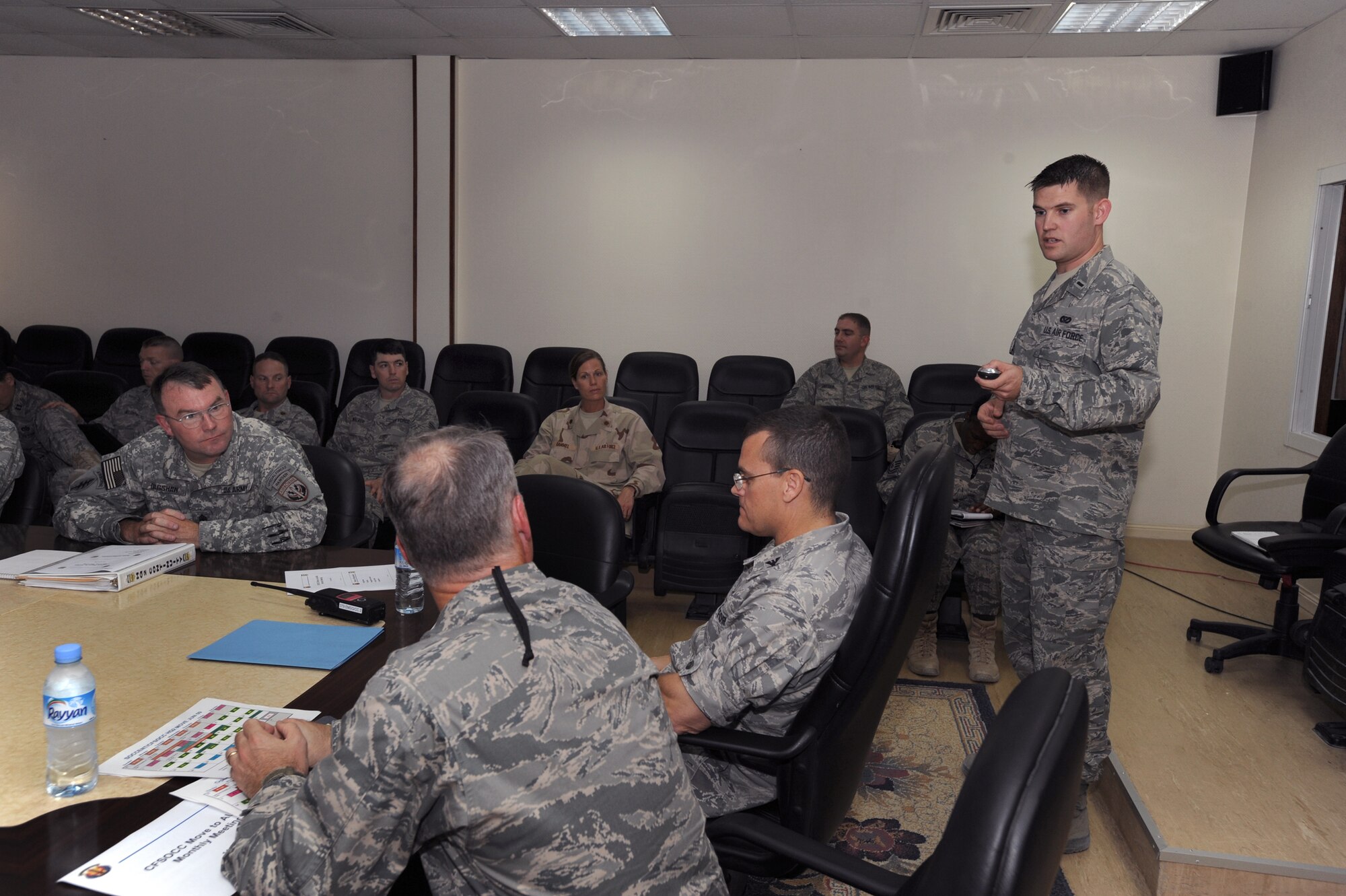 1st Lt. Brett Bailey organizes a transition meeting Thursday for Special Operations Command Central to coordinate with base agencies as they prepare to move here. He is deployed from the 60th Civil Engineer Squadron out of Travis Air Force Base, Calif. and is a native of Salisbury, N.H. (U.S. Air Force photo by Staff Sgt. Joshua Garcia/released)