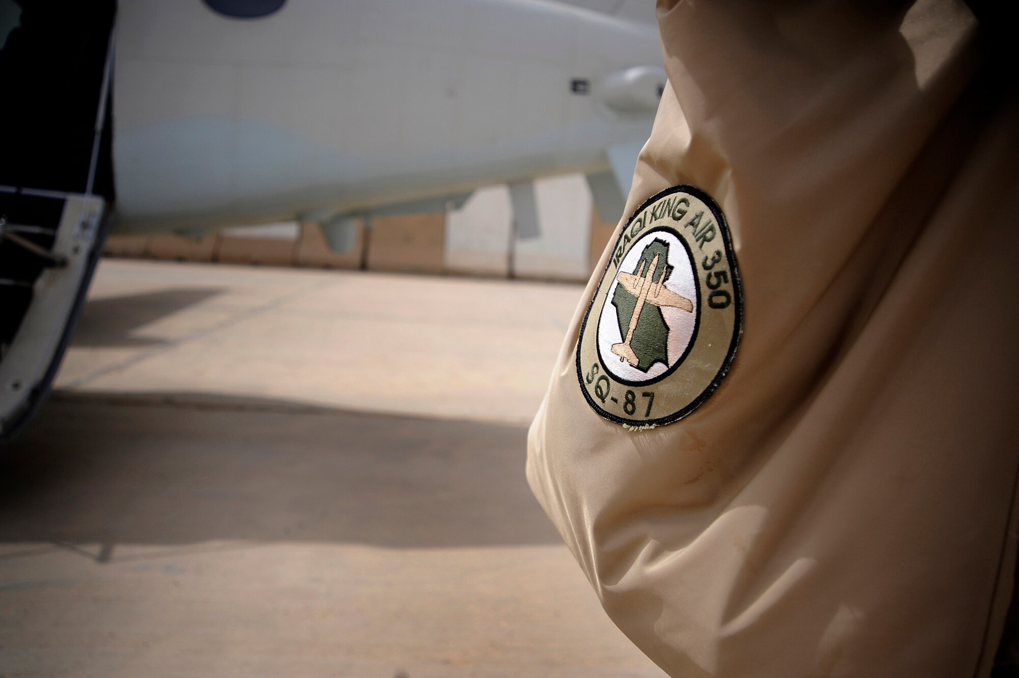 A U.S. Air Force pilot carries his bag after conducting Intelligence, Surveillance and Reconnaissance operations over Iraq, May 8, 2009.  (U.S. Air Force Photo by Staff Sgt. Shawn Weismiller)