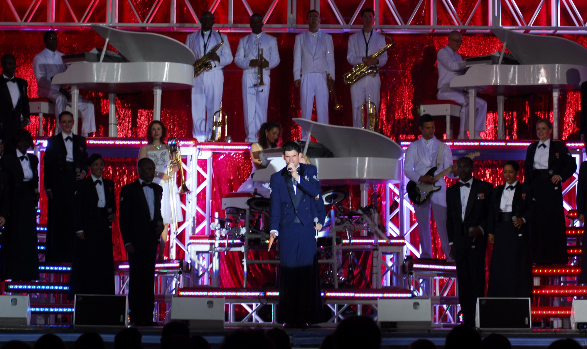 VANDENBERG AIR FORCE BASE, Calif. – Tops in Blue finishes with “one helluva roar” as they close their show with the Air Force song at Cabrillo High School in Vandenberg Village, Calif., June 13. This is the fifth stop in a 28 country tour. (U.S. Air Force photo/Airman 1st Class Kerelin Molina)