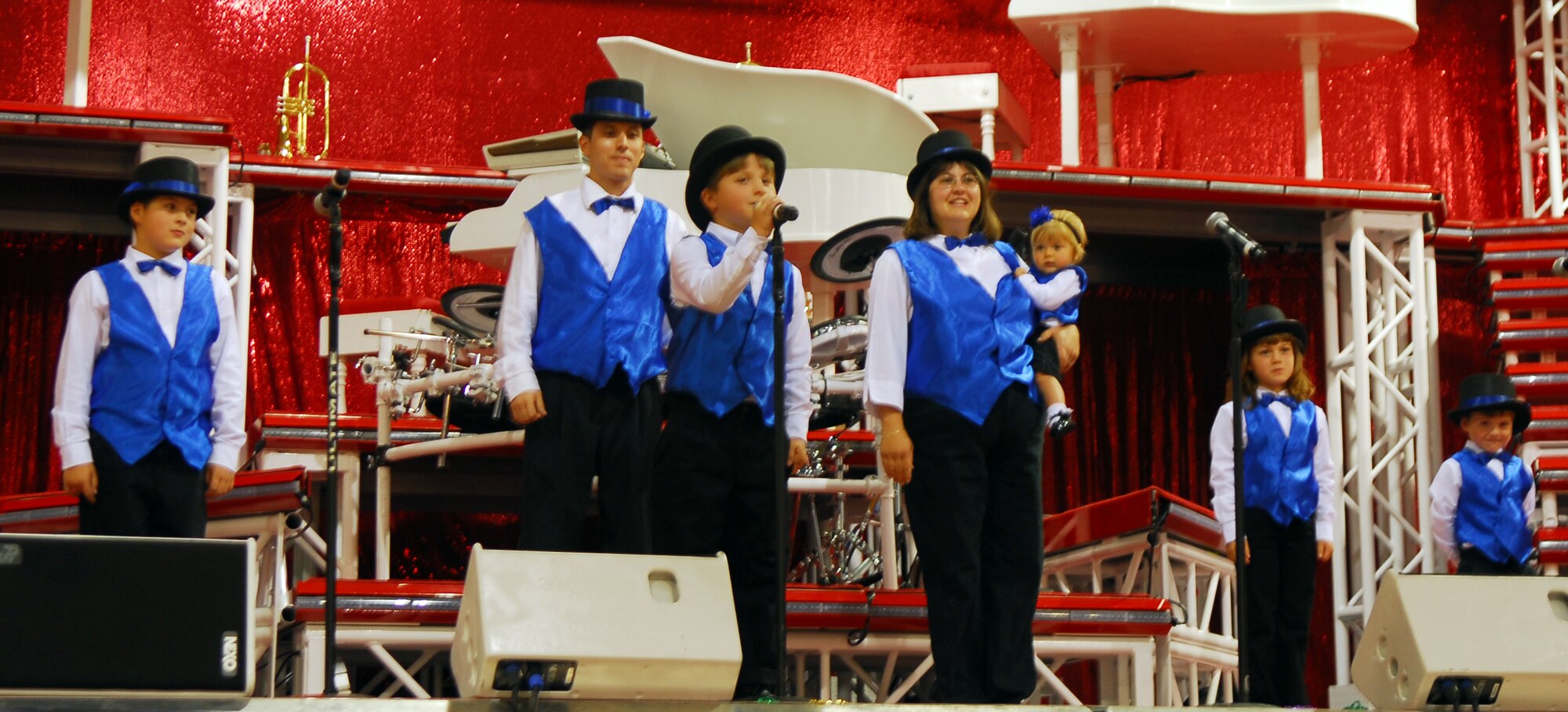 VANDENBERG AIR FORCE BASE, Calif. –The Hayward Family performs as the opening act of the 2009 Tops in Blue “To Dream” tour June 13 at Cabrillo High School in Vandenberg Village, Calif. The Hayward Family, Capt. Robert Hayward, Deborah Heyward and their five children, Spencer, Cameron, Karissa, Dallin and Janessa, was given the opportunity to perform after winning Air Force Family and Teen Talent Show. (U.S. Air Force photo/Airman 1st Class Kerelin Molina)