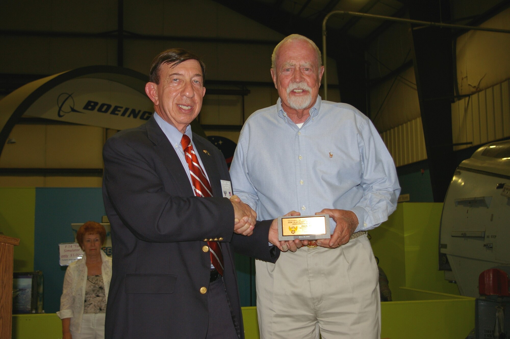 SUSTAINED PERFORMANCE: Col. Ledwitz presents the Sustained Outstanding Performance award to Paul Bell. Bell is a member of March’s Bob Hope CAFA chapter. (U.S. Air Force photo by George Williams)