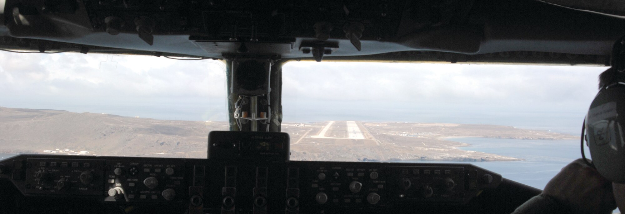 2nd Lt. Charles Roberts of the 336th Air Refueling Squadron, March ARB, mans the throttles and performs the landing checklist in a KC-135R Stratotanker during a training flight approach on San Clemente Island.  (U.S. Air Force photos by Senior Master Sgt. Michael Du)