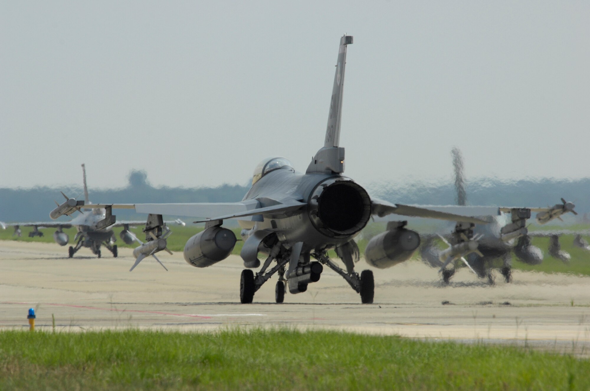 SHAW AIR FORCE BASE, S.C. -- Three F-16 aircraft pass each other on the runway during Team Shaw's operational readiness inspection, June 16. The ORI will evaluate Shaw's ability to survive and operate in combat conditions. (U.S. Air Force photo/Senior Airman Kathrine McDowell)