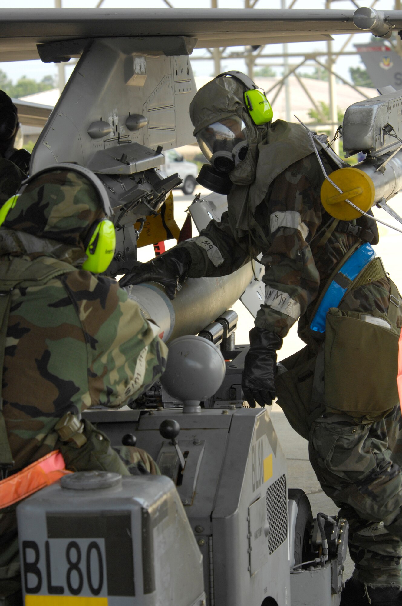 SHAW AIR FORCE BASE, S.C. -- Members of the 20th Aircraft Maintenance Squadron unload munitions from an F-16 aircraft during Team Shaw's operational readiness inspection, June 16. The ORI will evaluate Shaw's ability to survive and operate in combat conditions. (U.S. Air Force photo/Senior Airman Kathrine McDowell)