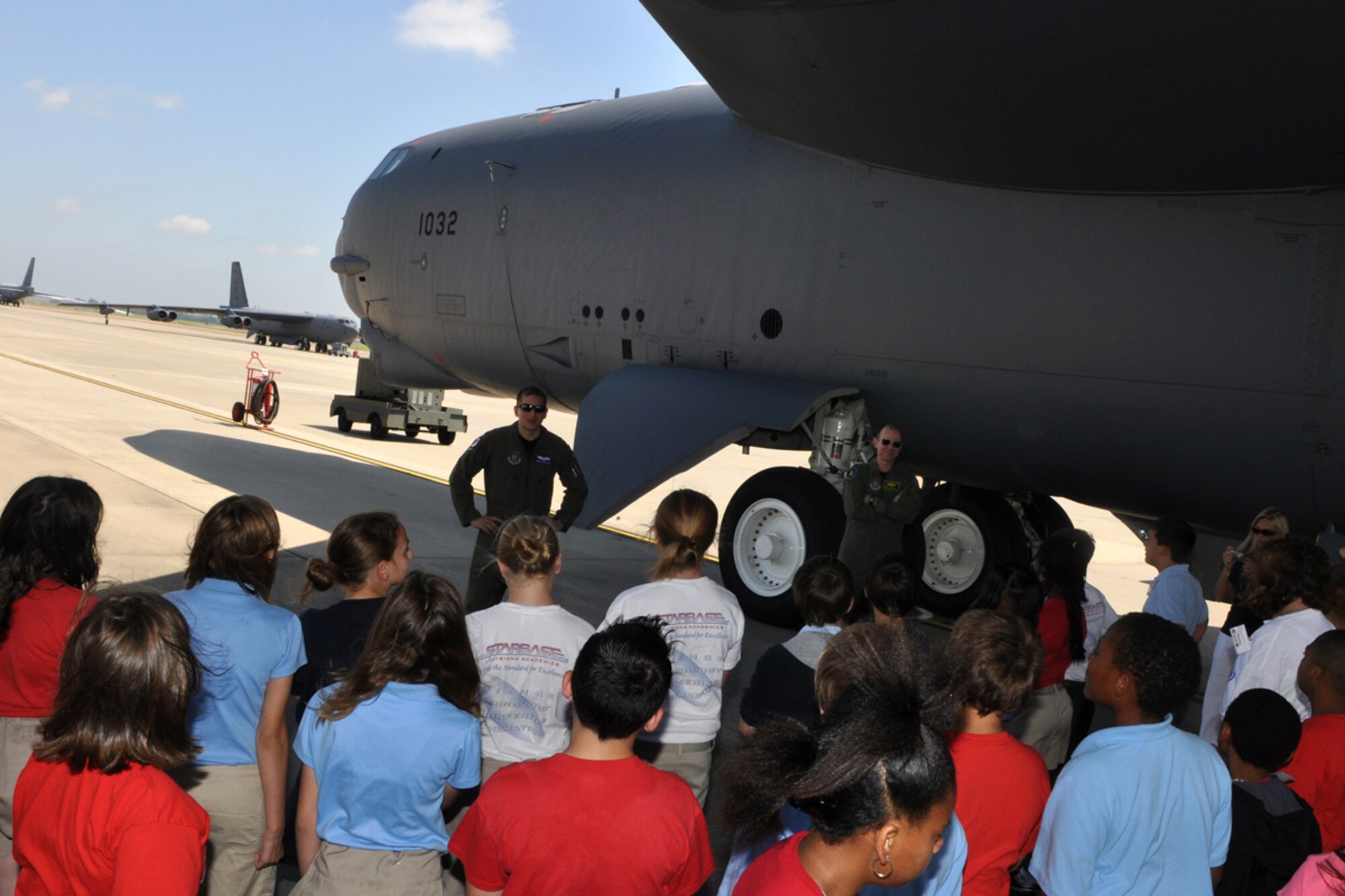 (L to R) Aircrew members with the 93rd Bomb Squadron, 1st Lt. Paul Gonzalez, co-pilot, and Lt. Col. Alan Ringle, instructor radar navigator, give a briefing on the B-52 Stratofortress to 5th graders in the STARBASE Louisiana program at Barksdale Air Force Base, La., June 16, 2009. The local program, which is one of 60 national STARBASE sites, is sponsored by the 917th Wing of the Air Force Reserve Command at Barksdale AFB. The program presents an exciting 25-hour hands on/minds on aviation and aerospace curriculum to area 5th grade students and their teachers. Over an average school year the 917th Wing will hosted over 60 tours for STARBASE classes at both the 93rd BS and the 47th Fighter Squadron. (U.S. Air Force photo/Tech. Sgt. Jeff Walston)