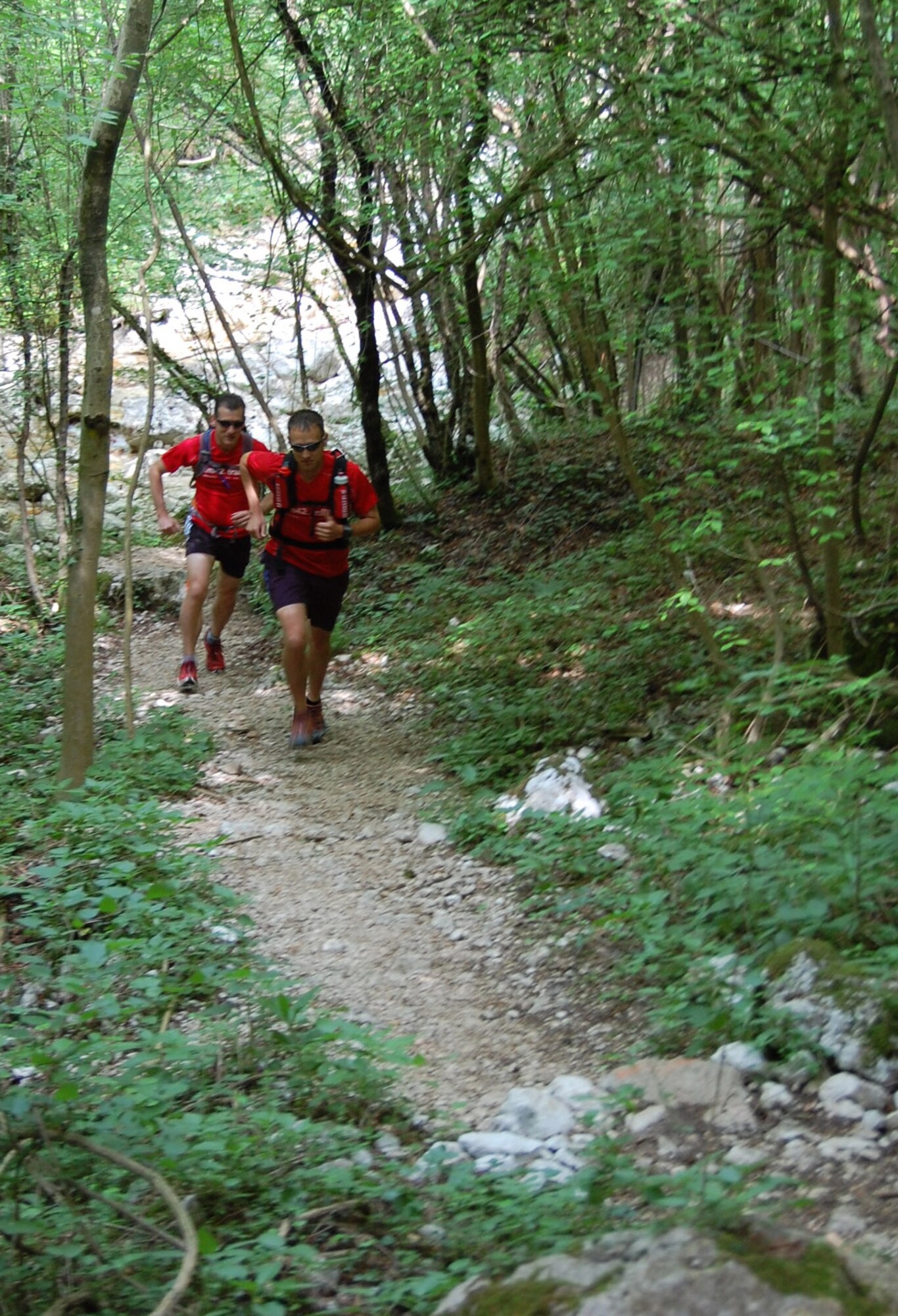 Jared Struck and Douglas Campfield run through trails in the "Prealpi" Dolomite mountain range north of Aviano as they train for the 9th Annual Le Grand Raid International du Cromagnon, a 34-mile extreme race through the Maritime Alps. The duo crossed the finish line on June 6 as 101 and 102 out of the 264 competitors. (U.S. Air Force photo/Staff Sgt. Lindsey Maurice)