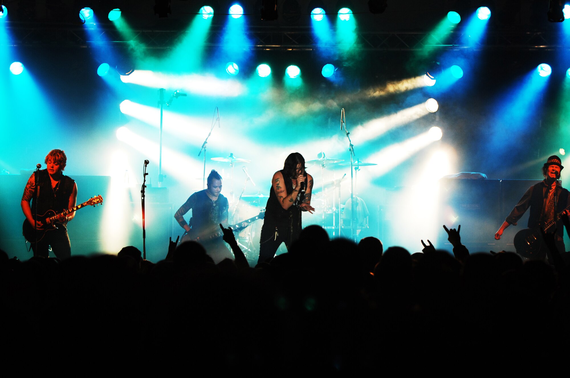 Rock band Hinder performs for servicemembers and their families, June 5, 2009, Ramstein Air Base, Germany. The Armed Forces Entertainment and Navy Entertainment indulged servicemembers overseas and at remote and isolated locations with entertainment to boost morale and welfare. (U.S. Air Force photo by Senior Airman Amber Bressler)