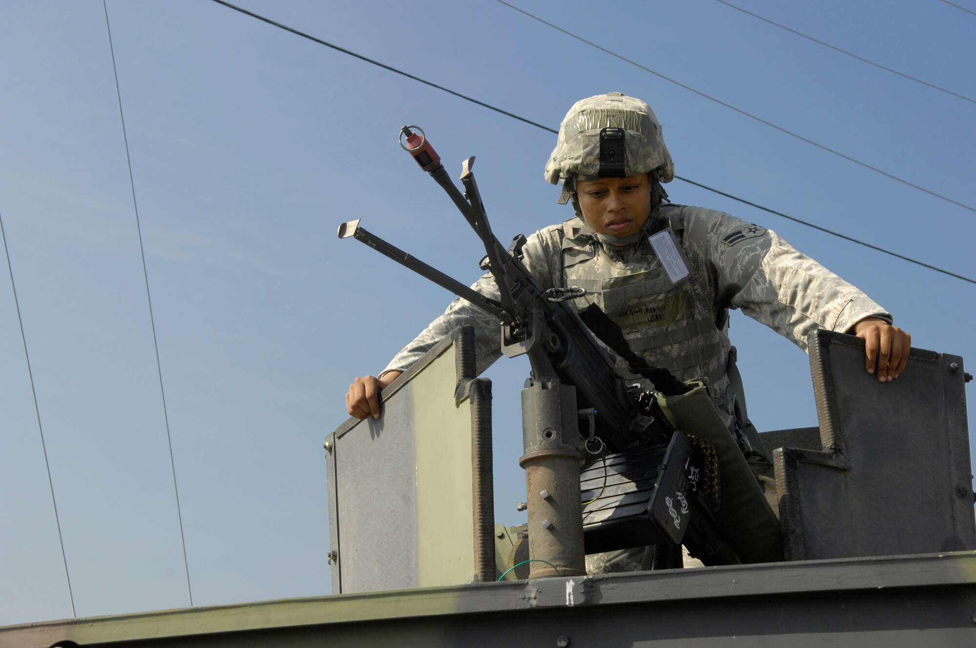 SHAW AIR FORCE BASE, S.C. -- Airman 1st Class Ashley Scott, 20th Security Forces Squadron personnel, waits for the start of a convoy movement to a simulated cantonment area for Team Shaw's operational readiness inspection, June 15. The ORI will evaluate Shaw's ability to survive and operate in combat conditions. (U.S. Air Force photo/Senior Airman Kathrine McDowell)