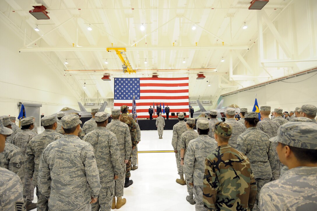ANDERSEN AIR FORCE BASE, Guam - Incoming commander, Col. Alan Weider assumes his spot in the middle on stage after taking command of the 36th Mission Support Group during the change of command ceremony held in Hangar 6 June 16. Members of the 36th MSG witnessed the change of command ceremony where leadership transferred from Col. Mark Talley to Colonel Wieder. (U.S. Air Force photo by Tech. Sgt. Michael Boquette)
