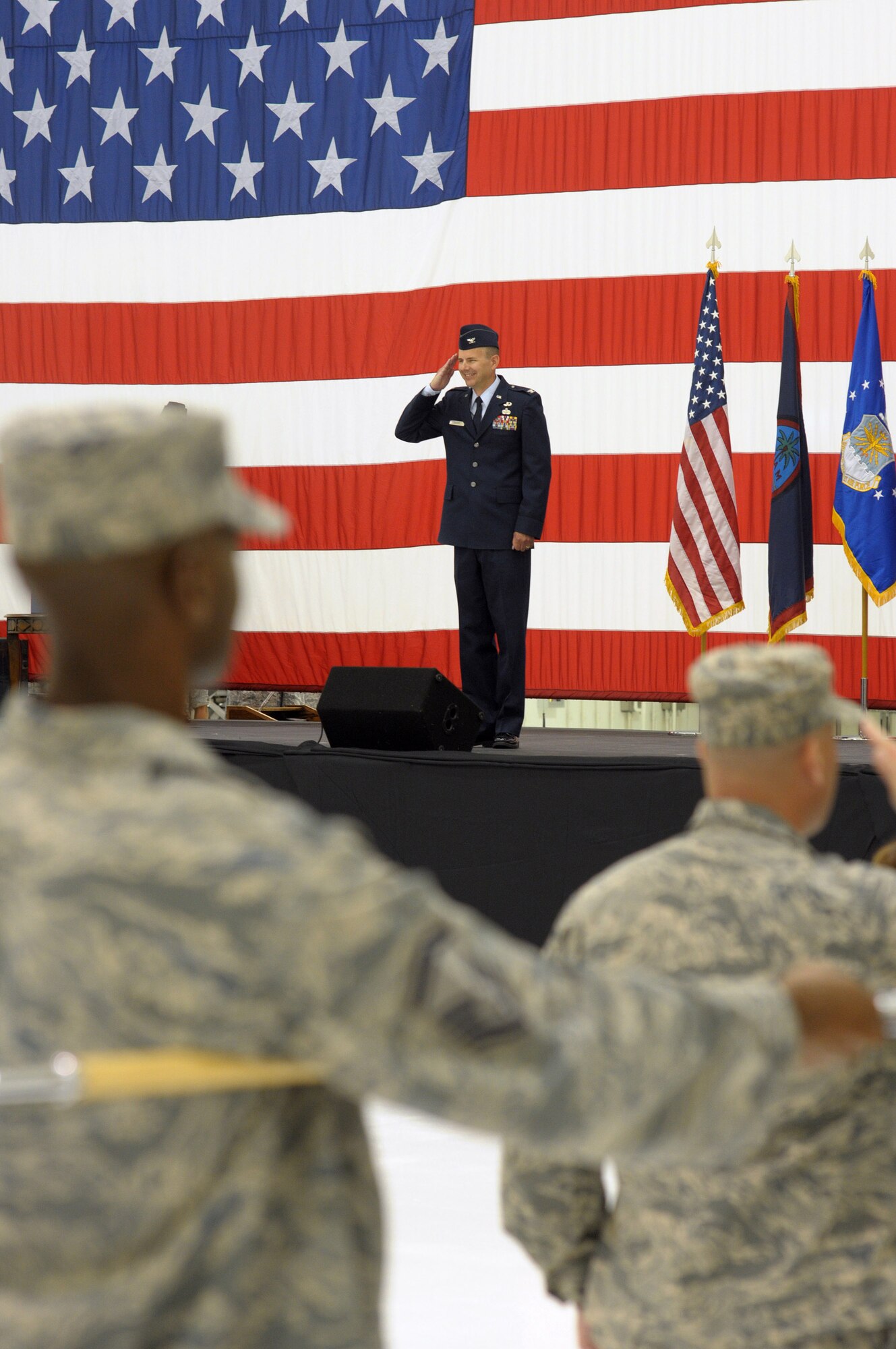 ANDERSEN AIR FORCE BASE, Guam - New 36th Mission Support Group commander, Col. Alan Weider receives his initial salute from the assembled squadrons that fall under the 36th MSG at the change of command ceremony held in Hangar 6 June 16. The change of command ceremony transferred leadership of the 36th MSG from Col. Mark Talley to Colonel Wieder. (U.S. Air Force photo by Tech. Sgt. Michael Boquette)
