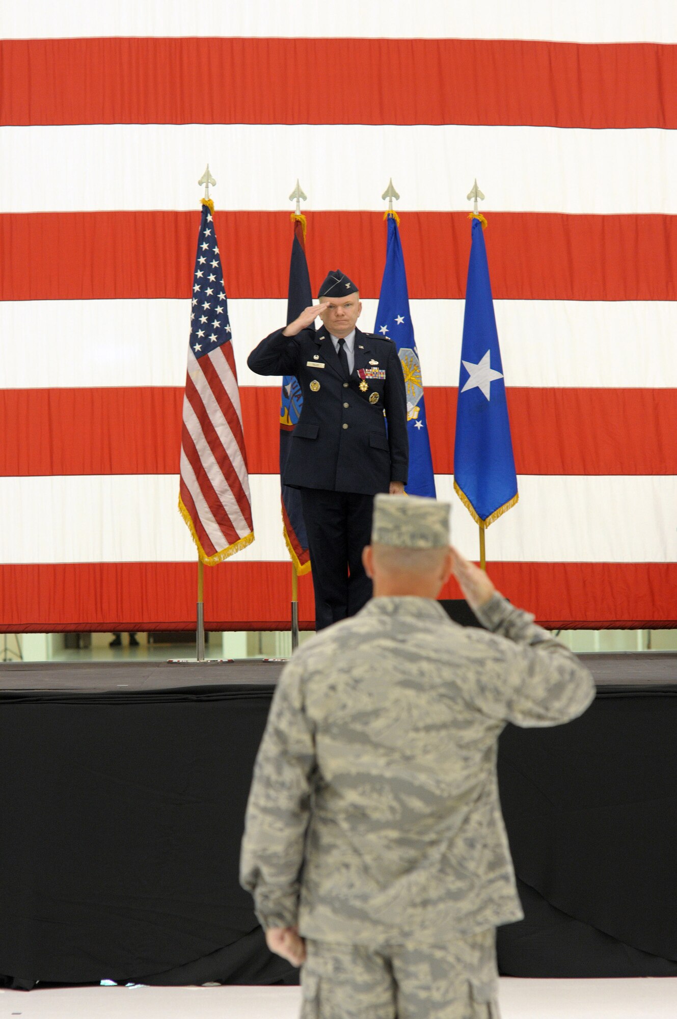 ANDERSEN AIR FORCE BASE, Guam  
Col Mark Talley, receives his final salute from the assembled squadrons that fall under the Mission Support Group.The Change of Command ceremony transitions leadership of the MSG from Col Talley to Col Alan Wieder .   (US Air Force photo by Tech. Sgt. Michael Boquette/Released)