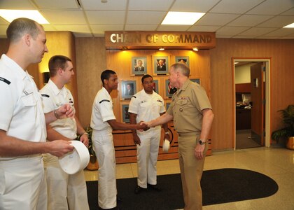 Offutt AFB, Neb - USS Nebraska (SSBN 739) Gold crewmembers meet with Vice Adm Van Mauney, Deputy Commander, U.S. Strategic Command, at USSTRATCOM Headquarters.  The USS Nebraska crewmembers visited the Heartland on a trip sponsored by the Big Red Sub Club, attending the NEBRASKAland DAYS festivities in North Platte and touring other local attractions.