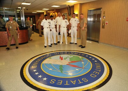 Offutt AFB, Neb - USS Nebraska (SSBN 739) Gold crewmembers meet with Vice Adm Van Mauney, Deputy Commander, U.S. Strategic Command, at USSTRATCOM Headquarters.  The USS Nebraska crewmembers visited the Heartland on a trip sponsored by the Big Red Sub Club, attending the NEBRASKAland DAYS festivities in North Platte and touring other local attractions.