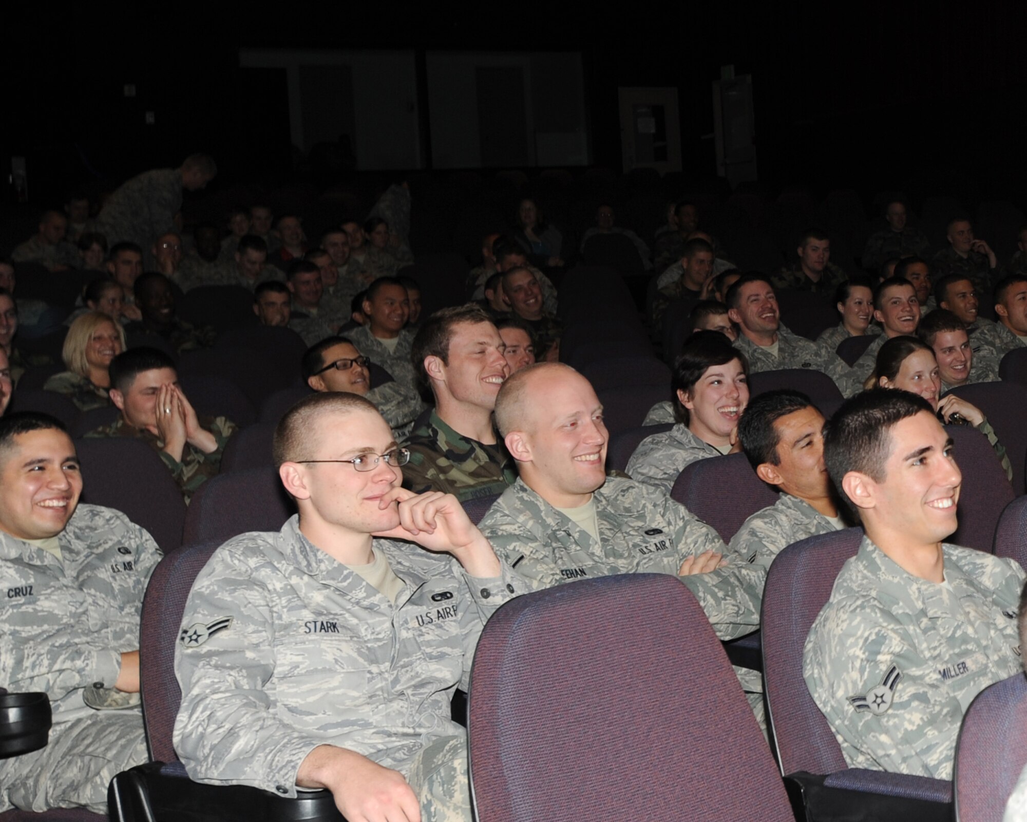 ELMENDORF AIR FORCE BASE, Alaska -- Airmen enjoy a morning break during a comedic performance by Bernie McGrenahan June 16. McGrenahan's show puts a comedic twist on Alchohol and Drug abuse prevention from his own personal life experiences. (U.S. Air Force photo/Airman 1st Class Kristin High)