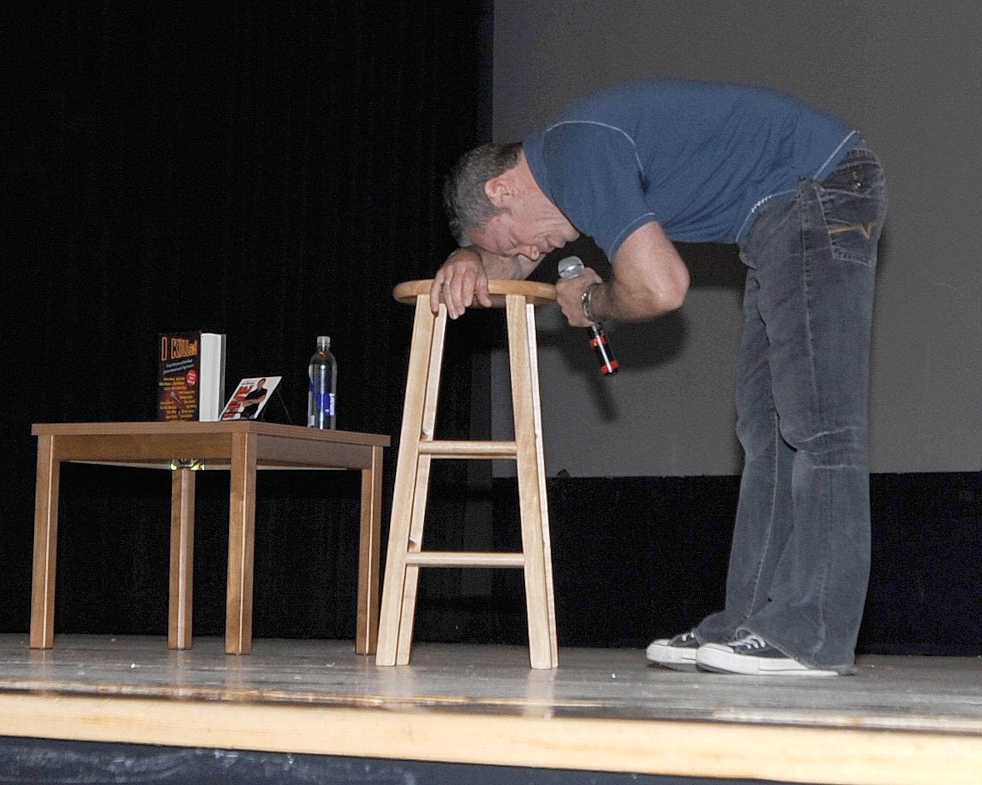 ELMENDORF AIR FORCE BASE, Alaska -- Comedian Bernie McGrenahan performs during his "Happy Hour" tour June 16. McGrenahan's show puts a comedic twist on Alchohol and Drug abuse prevention from his own personal life experiences.(U.S. Air Force photo/Airman 1st Class Kristin High)