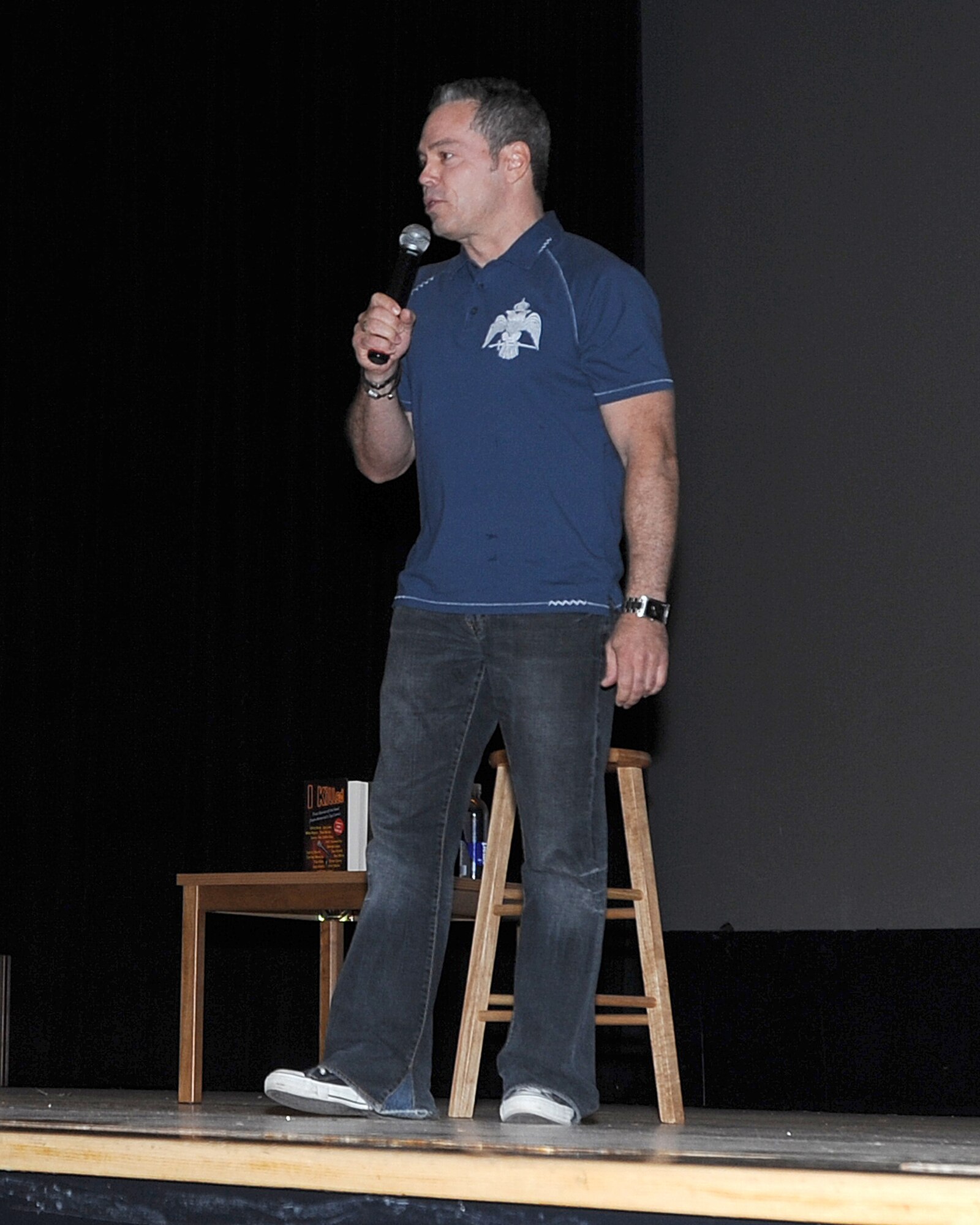 ELMENDORF AIR FORCE BASE, Alaska -- Comedian Bernie McGrenahan performs during his "Happy Hour" tour June 16. McGrenahan's show puts a comedic twist on Alchohol and Drug abuse prevention from his own personal life experiences. (U.S. Air Force photo/Airman 1st Class Kristin High)