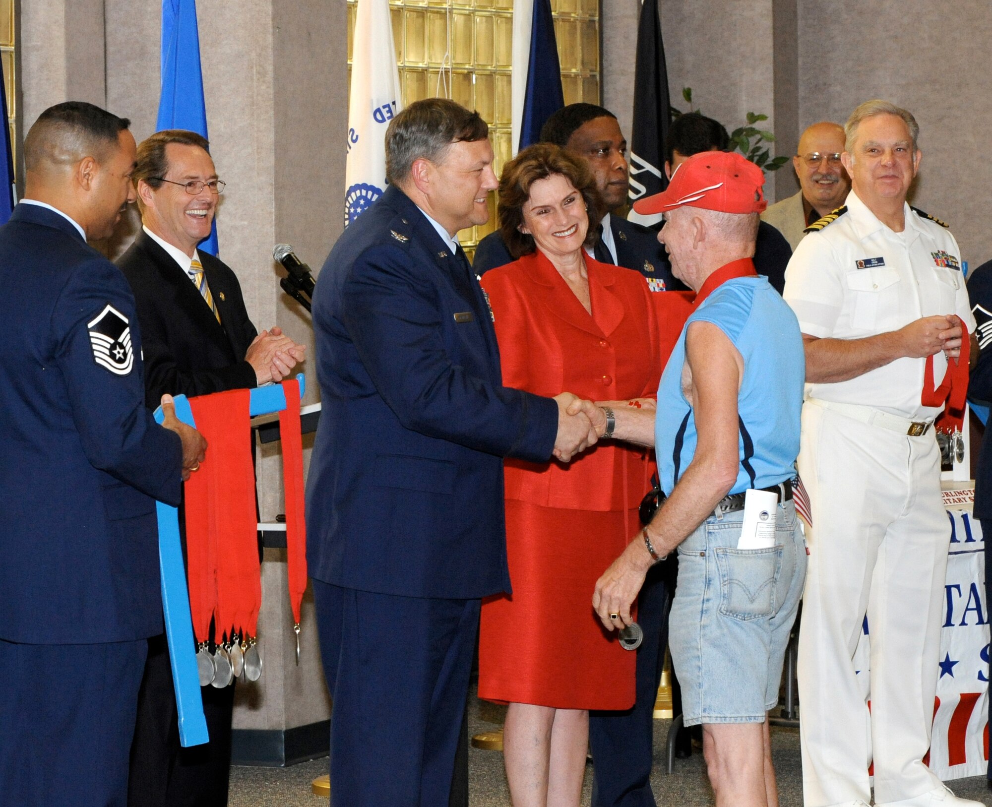Burlington County Military Veterans of all branches are honored with the Burlington County Military Service Medal on June 17 by the Board of Chosen Freeholders of Burlington County, N.J. Presenting the medals were New Jersey Senator Phillip Haines, second from left, Deputy Director of Mobility Operations for the U.S. Air Force Expeditionary Center Col. Darryl Stankevitz, third from left, Freeholder Mary Anne Reinhart, fourth from left, and retired Navy Capt. Capt. Walter Urban Jr., last on right. The medal ceremony not only honors veterans, but is also used by the Burlington County Department of Military and Veterans Services Office to update their records and to keep the vets and their family members informed of the benefits and services to which they are entitled. (U.S. Air Force photo/Wayne Russell)
