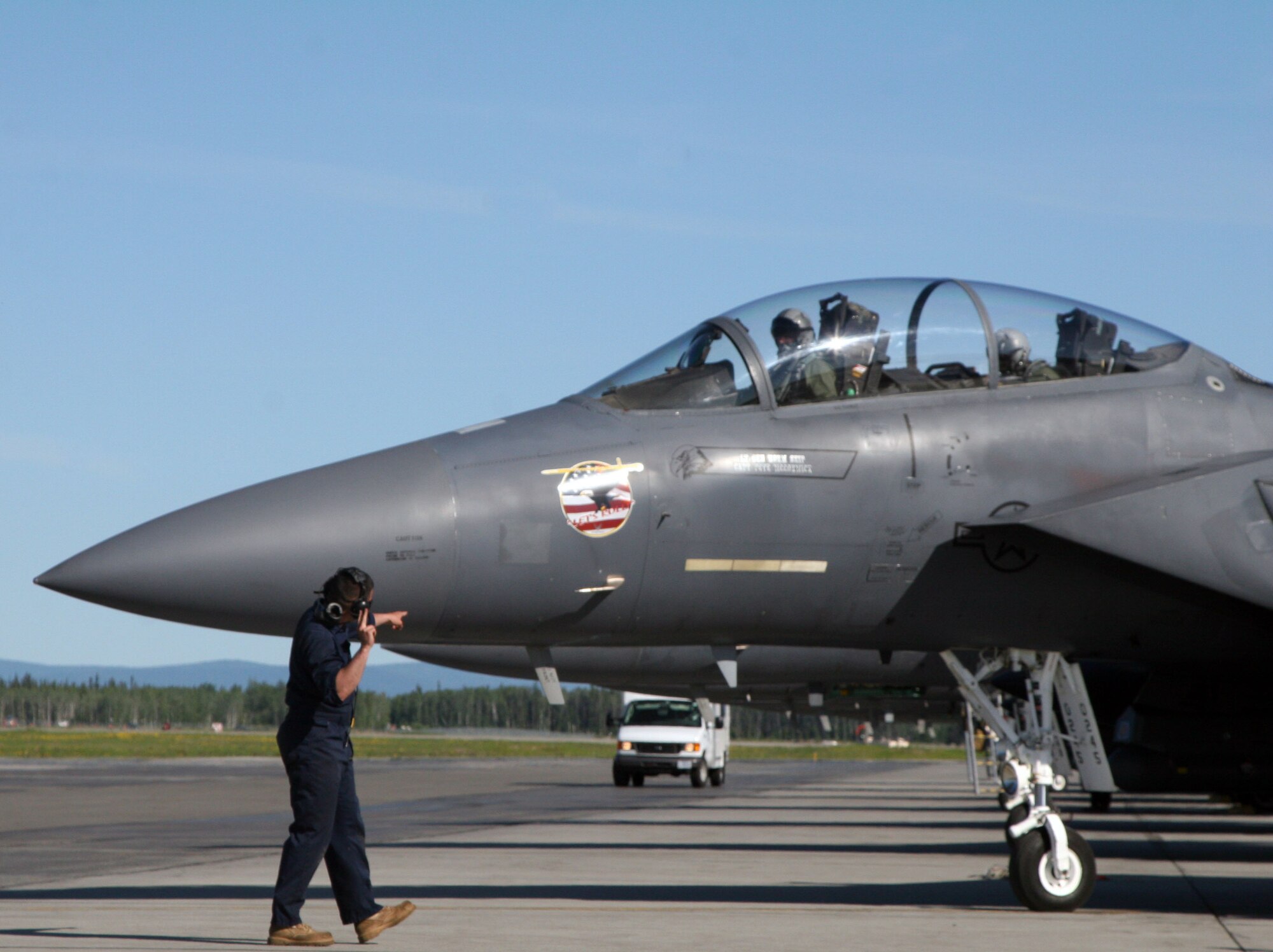 EIELSON AFB, Alaska -- An F-15 Strike Eagle from Mountain Home Air Force
Base prepares for takeoff here June 16.  The F-15 is participating in
Exercise Northern Edge 2009.
(U.S. Marine Corps Photo by Staff Sgt. Andrew Miller)

 
