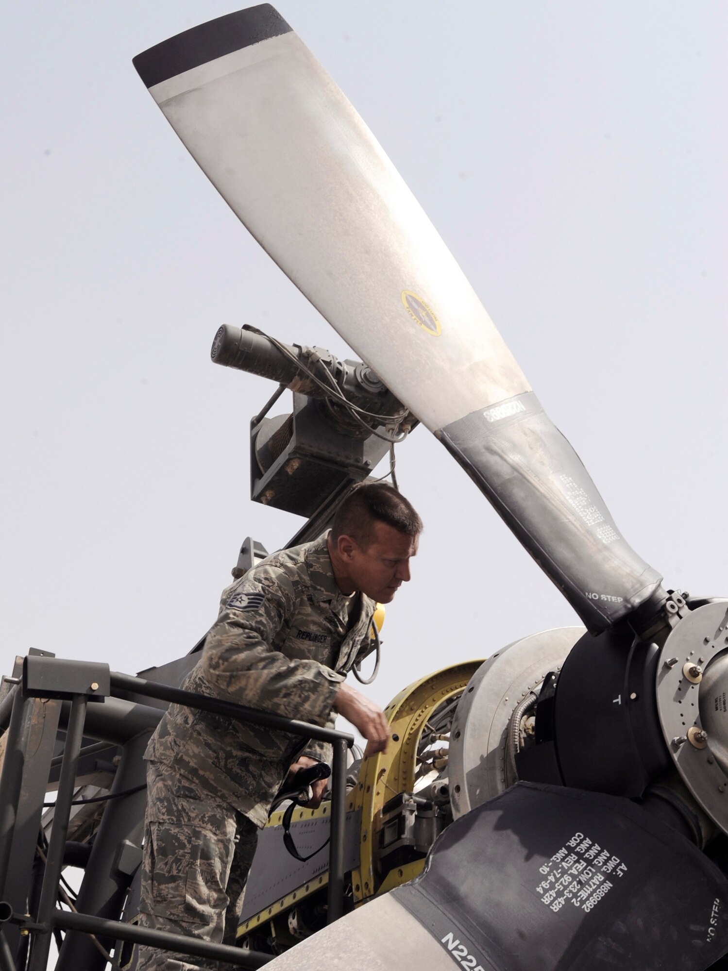 Tech. Sgt. Richard Replinger, a turbo propulsion craftsman with the 379th Expeditionary Maintenance Squadron at an air base in Southwest Asia, performs a pre-run inspection on a C-130H Hercules engine June 14 prior to running a test on the engine.  This is the only T56 test cell in the U.S. Central Command area of responsibility.  The T56 enables maintainers to test engines in the AOR instead of sending them back to Ramstein Air Base, Germany.  Sergeant Replinger, a native of Fayetteville, N.C., is deployed from Hurlburt Field, Fla.  (U.S. Air Force photo/Staff Sgt. Joshua Garcia)
