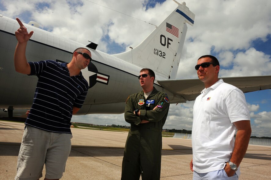 OFFUTT AIR FORCE BASE Neb.,-- Pitcher Matt Harvey (left) and Equipment Manager Nate Warbrough (right) talk with Capt. Sean McCarthy with the 343rd Reconnaissance Squadron as they toured an RC-135V/W Rivet Joint, a reconnaissance platform, located on the parking ramp here as part of a base tour where members of the Tar heels got an inside look at the mission of the 55th Wing, 15 June.  The Tar Heels baseball team is competing in the NCAA College World Series hosted at Omaha's Rosenblatt Stadium June 13-23/24.U.S. Air Force Photo by Josh Plueger