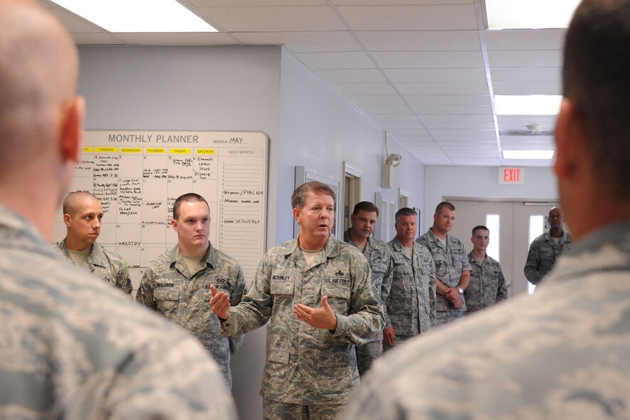 Chief Master Sgt. of the Air Force Rodney McKinley speaks with Airmen in the aircrew flight equipment building on Seymour Johnson Air Force Base, N.C., June 12, 2009. Airmen asked about his work in the Pentagon, the Post 9/11 GI Bill, and how Seymour Johnson AFB has changed since he was stationed here in the 1970s. (U.S. Air Force photo by Airman 1st Class Whitney S. Lambert)