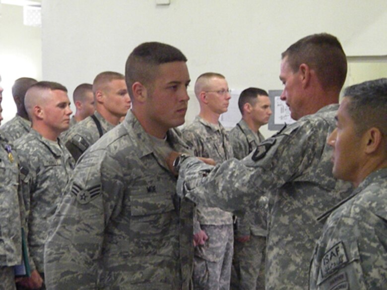 Members of the 139th Security Forces Squadron earned Combat Action Badges and coins recognizing excellence from a two-star army general while deployed to Afghanistan in support of the Missouri Agri-Business Development Team there. 
