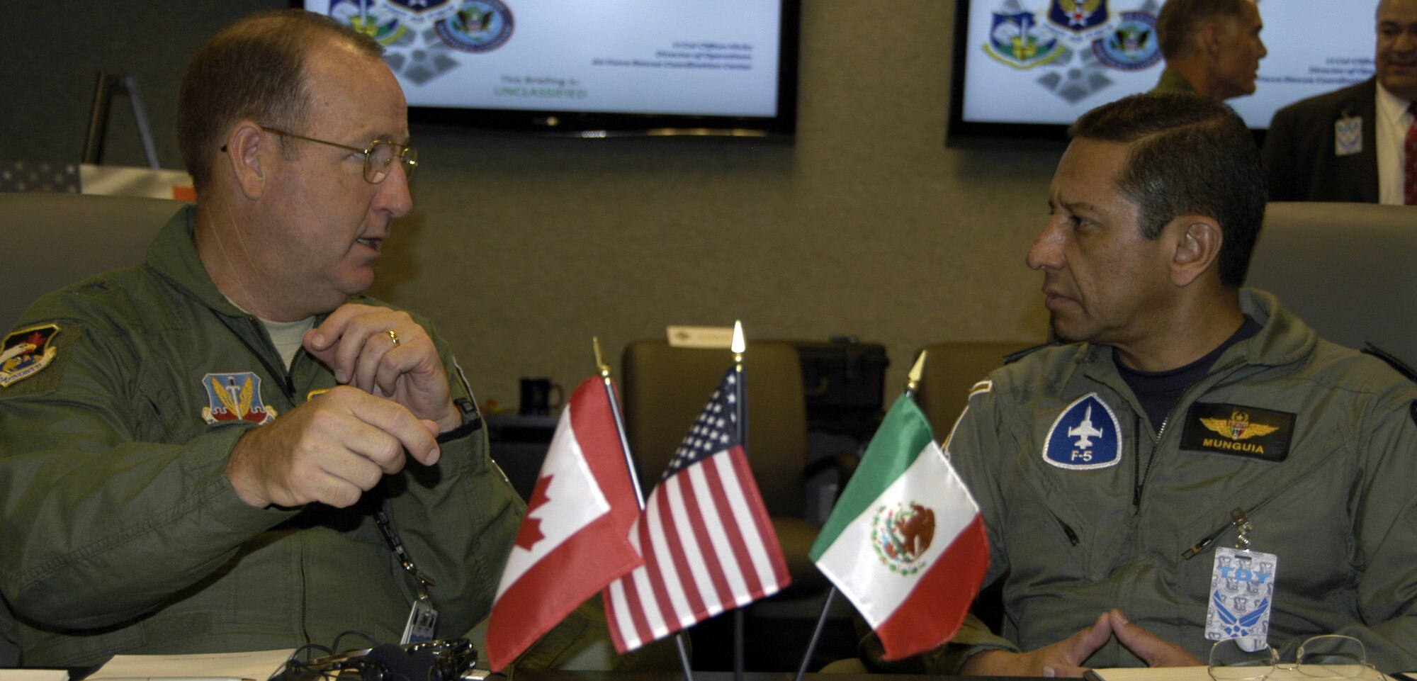 First Air Force commander Maj. Gen. Hank Morrow (left) discusses North
American homeland operations with Maj. Gen. Carlos Antonio Rodriguez
Munguia, deputy director of operations for the Mexican Air Force.
