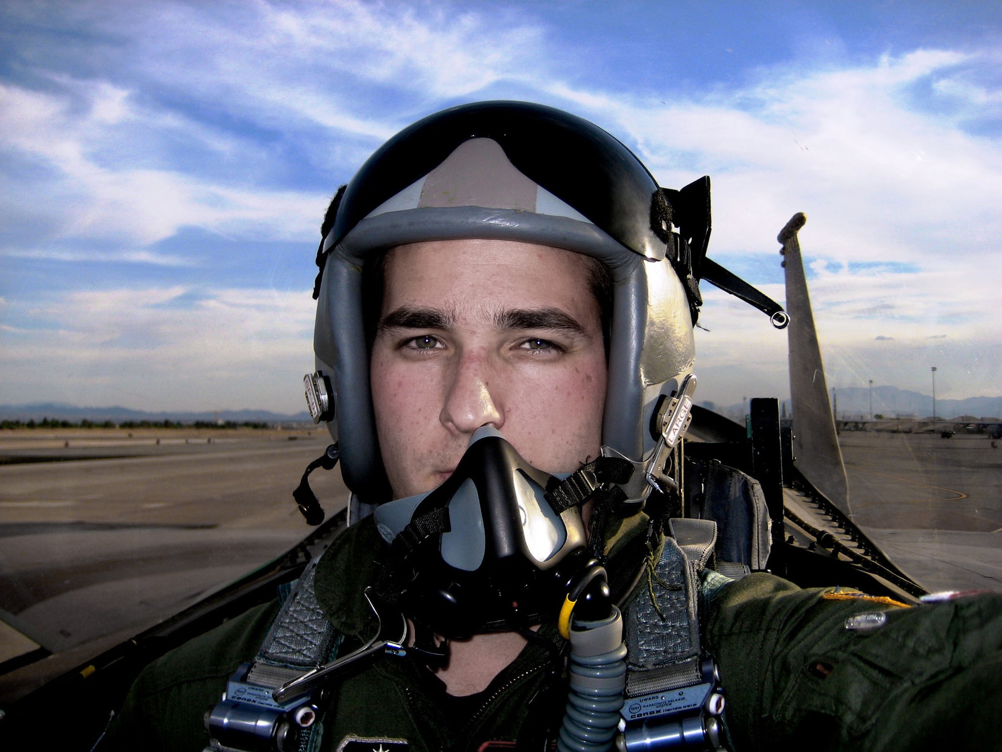 Cadet First Class Andrew Novak receives an incentive flight in the back seat of an F-15 Eagle during a training sortie with a pilot from the 65th Aggressor Squadron at Nellis Air Force Base, Nev.  Cadet Novak spent five weeks at the Air Force Operational Test and Evaluation Center's Detachment 6 at Nellis as part of a mentoring program between AFOTEC and the United States Air Force Academy. The program leverages AFOTEC experience in operations, acquisitions and testing to create a comprehensive learning experience for Academy cadets during their academic and professional development. Cadet Novak is an aeronautical engineering student. (Courtesy photo)