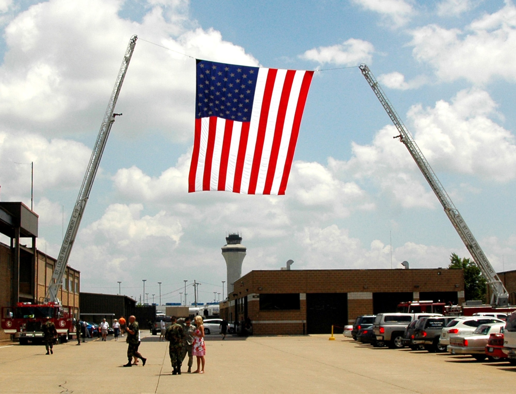 ST. LOUIS - A flag waves gently in the breeze June 13 at the End of Era ceremony held at the 131st Fighter Wing Missouri Air National Guard Base-Lambert Field. The Saint Louis City Fire Department assisted in the event with a display of the American flag. The ceremony commemorated the culmination of 86 years of flying operations in Saint Louis. (U.S. Air Force Photo/Master Sgt. Mary-Dale Amison)