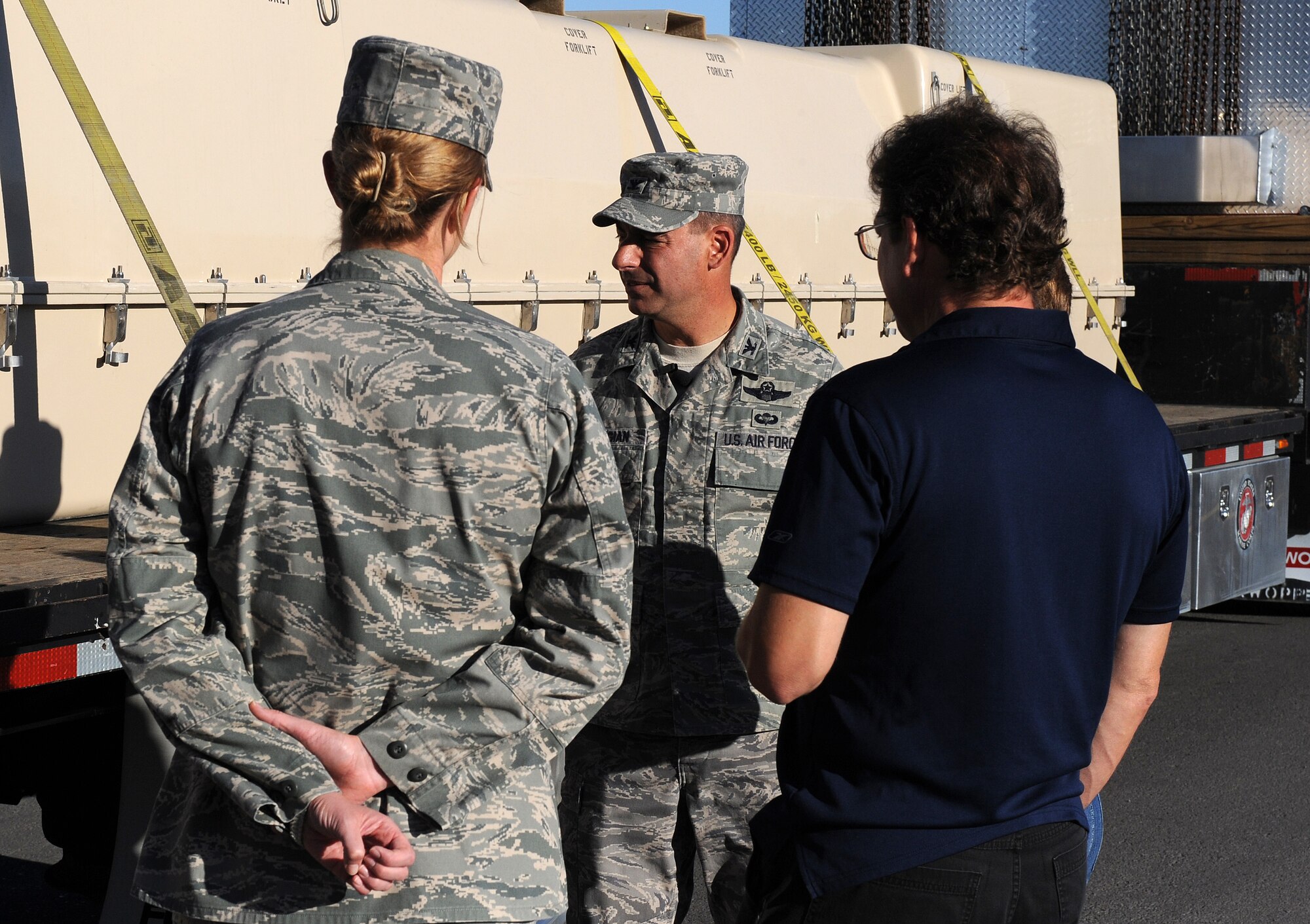 Col. Jeff Harrigian, 49th Fighter Wing commander, speaks about the arrival of the first unmanned aircraft system (UAS) to Holloman Air Force Base, N.M., June 16.The Predator is part of a UAS program which is currently housed temporarily at Holloman pending an announcement on the official location of the second UAS Formal Training Unit. (U.S. Air Force photo/Senior Airman Michael Means)