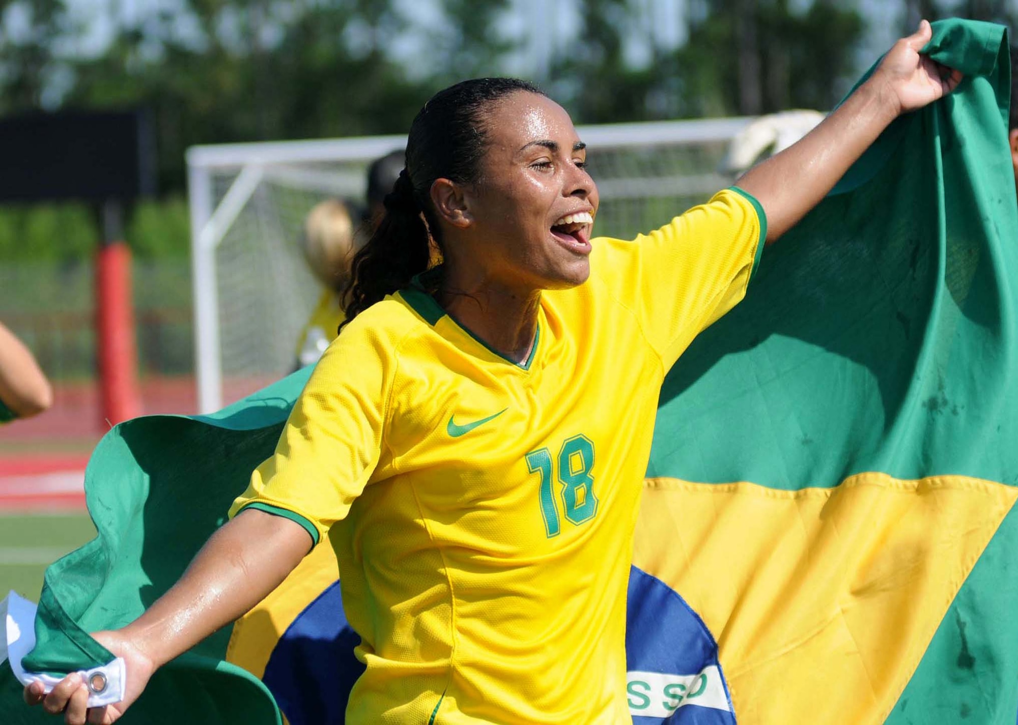 Ana Paula Silva de Frietas demonstrates her national pride after a 1-0 victory by the Brazilian team over the Republic of Korea in the championship game of the Counseil du International Sports Militaire Women’s Soccer championship tournament, Saturday at Biloxi High Stadium.  Teams from Canada, France, Germany, The Netherlands and the United States also participated in the competition hosted by Keesler which began June 6.  (U.S. Air Force photo by Kemberly Groue)