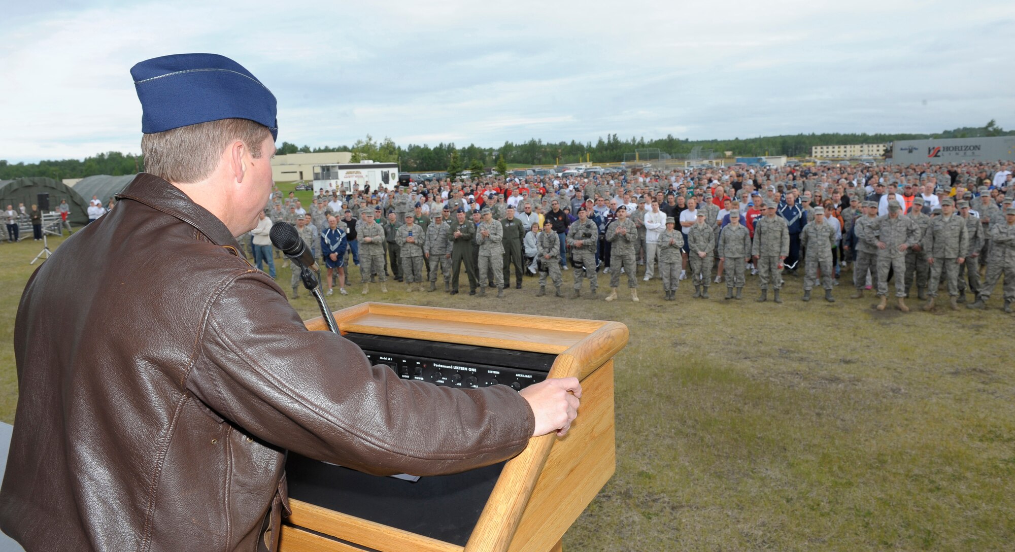 ELMENDORF AIR FORCE BASE, Alaska -- Col. Thomas Bergeson, 3rd Wing commander, speaks to hundreds of Arctic Warriors during the Operational Readiness Inspection outbrief June 12. During the outbrief, Bergeson announced Elmendorf's overall excellent rating during the 2009 ORI. (U.S. Air Force photo/Master Sgt. Keith Brown)