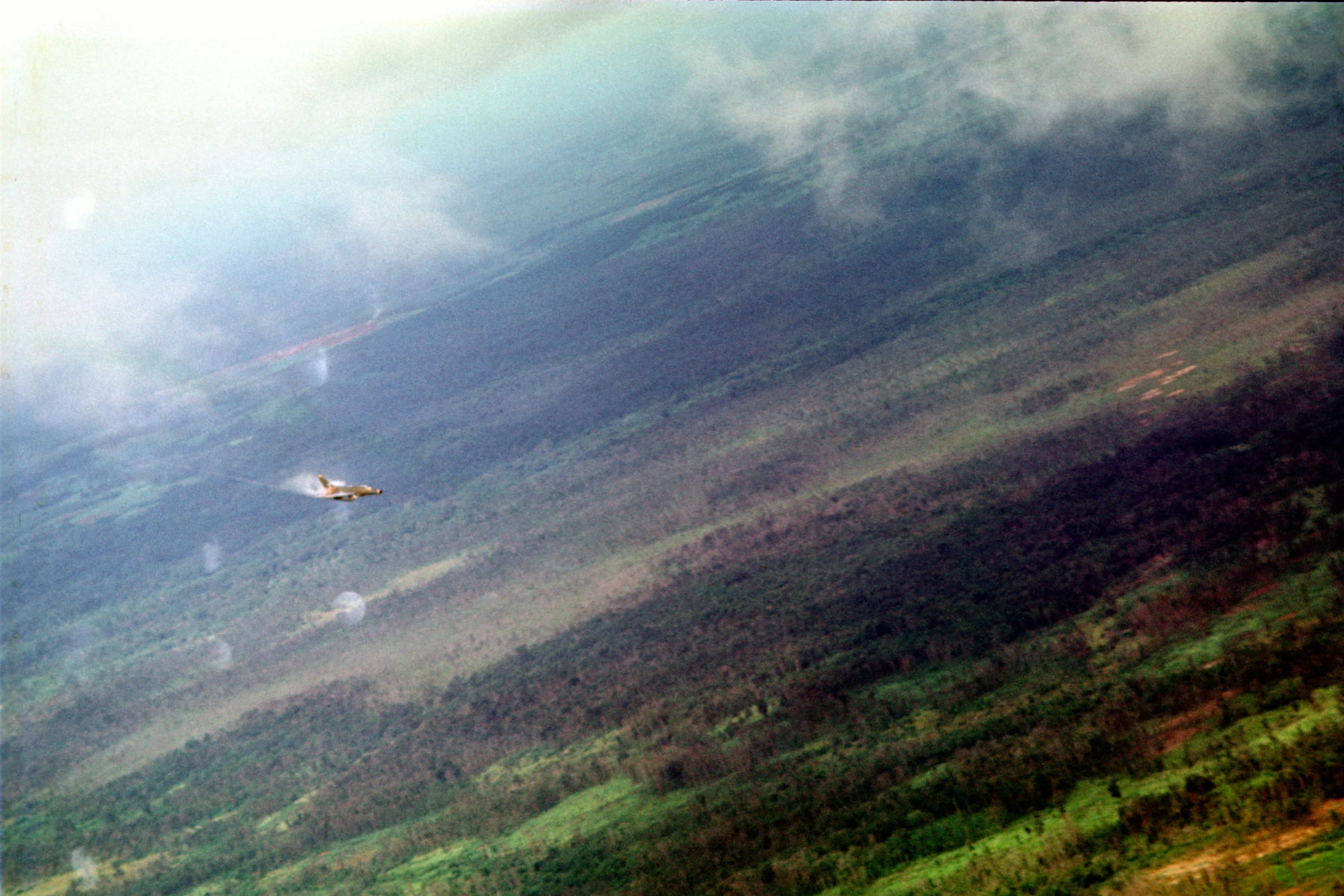 Strike aircraft could only attack after being “cleared hot” by the FAC. This F-100 from the 35th Tactical Fighter Wing, with the call sign Yellow Jacket 11 has been cleared hot to attack an enemy target in September 1969. (U.S. Air Force photo)