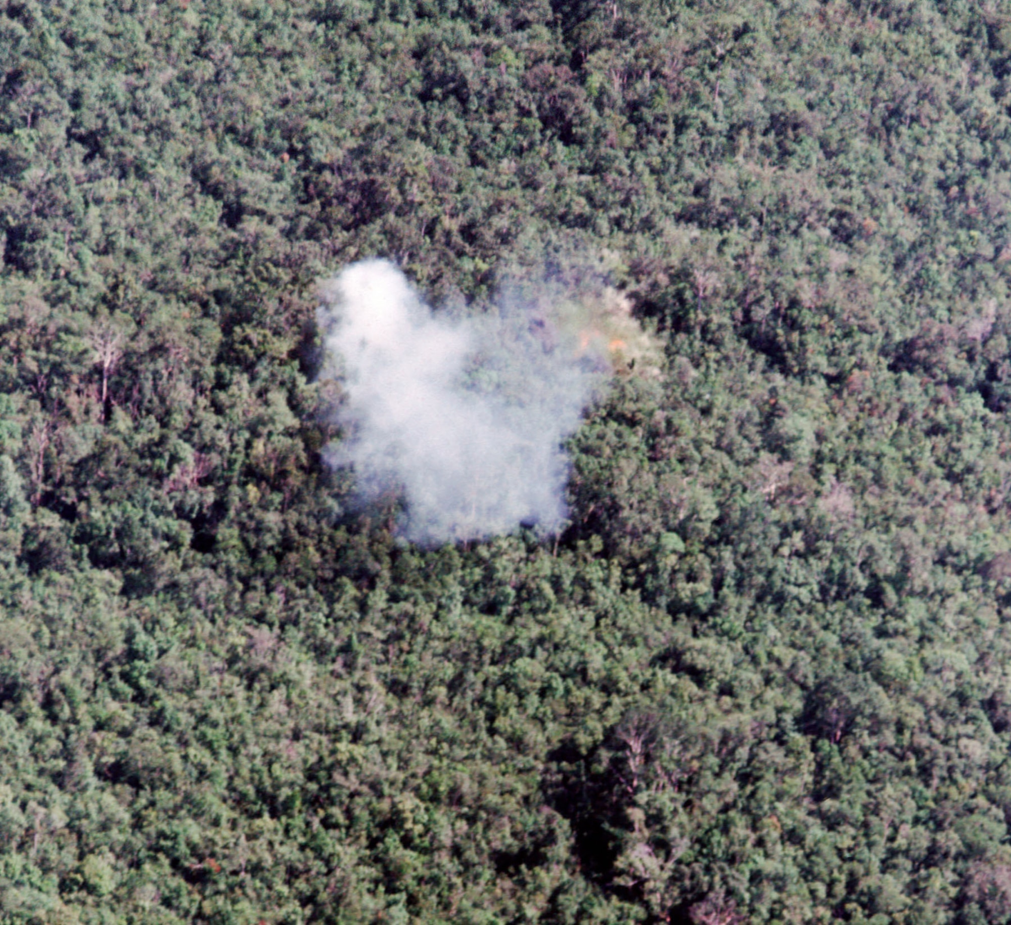 Smoke from a white phosphorus rocket marking the target. The FAC used this smoke to guide the strike aircraft and direct the attack. When certain that the fighter pilot was attacking the correct target, using the right weapons, and not threatening friendly troops or civilians, the FAC gave permission to attack. (U.S. Air Force photo)